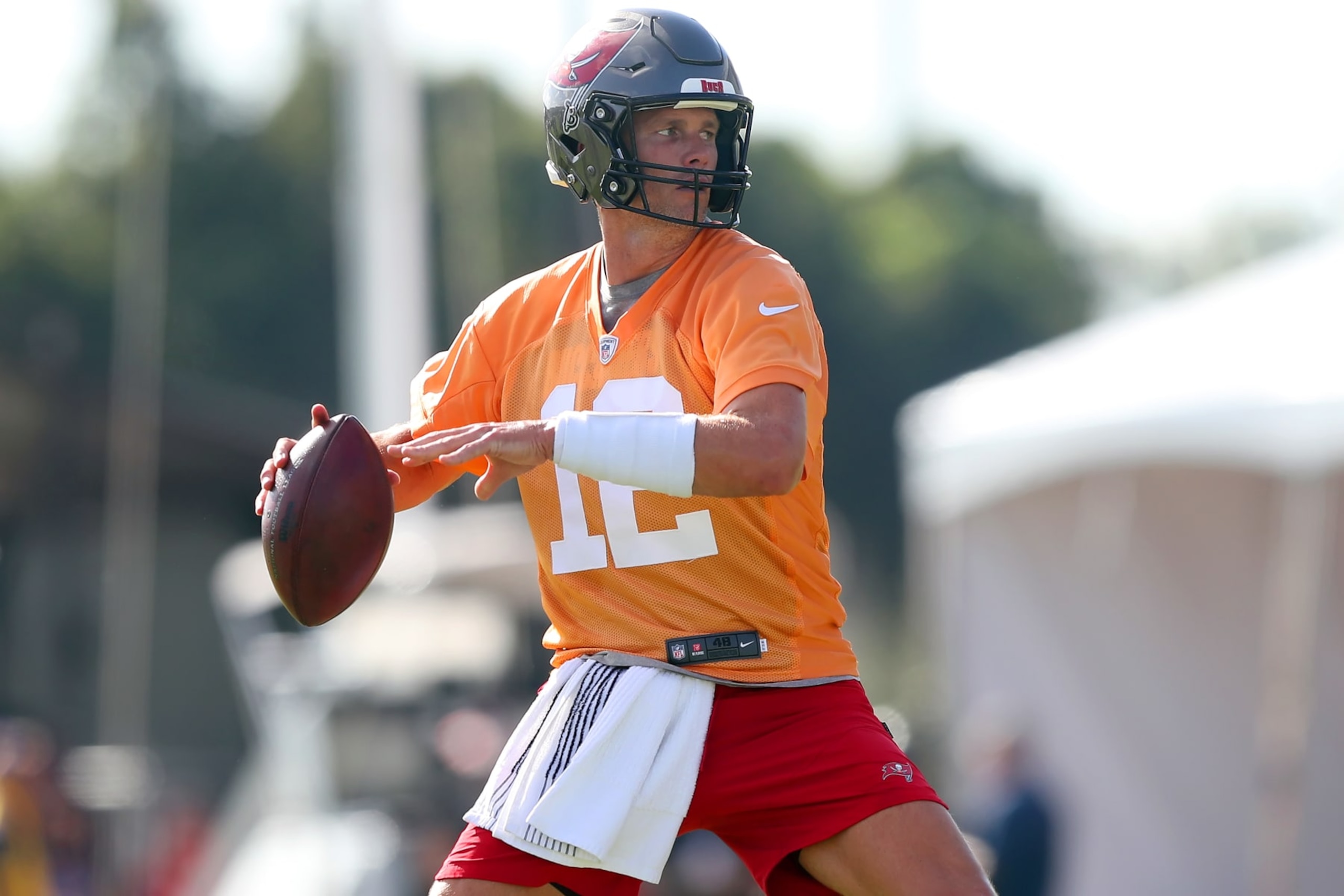 TAMPA, FL - JUL 30: Tampa Bay Buccaneers quarterback Tom Brady (12) throws a pass during the Tampa Bay Buccaneers Training Camp on July 30, 2022 at the AdventHealth Training Center at One Buccaneer Place in Tampa, Florida. (Photo by Cliff Welch/Icon Sportswire via Getty Images)