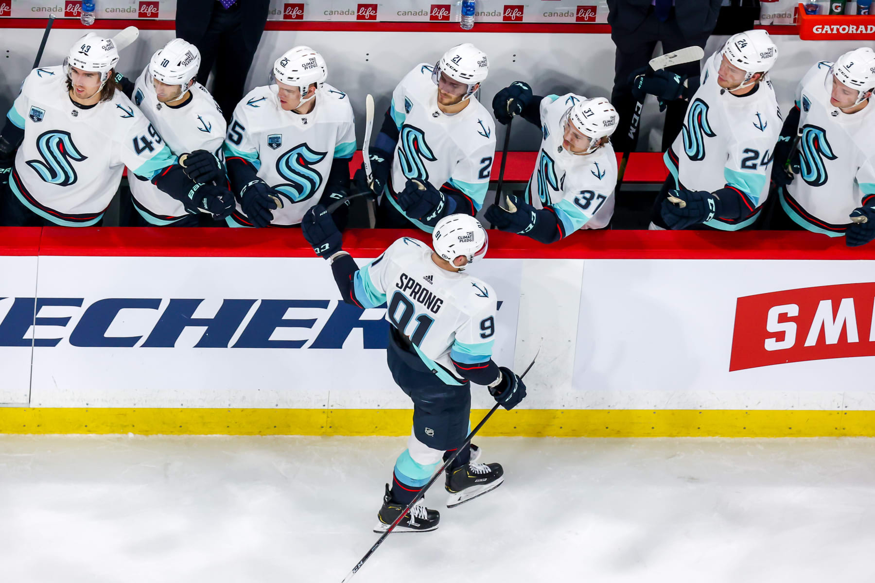 WINNIPEG, MB - MAY 01: Daniel Sprong #91 of the Seattle Kraken skates by the bench to celebrate his second period goal against the Winnipeg Jets at Canada Life Centre on May 01, 2022 in Winnipeg, Manitoba, Canada. (Photo by Jonathan Kozub/NHLI via Getty Images)