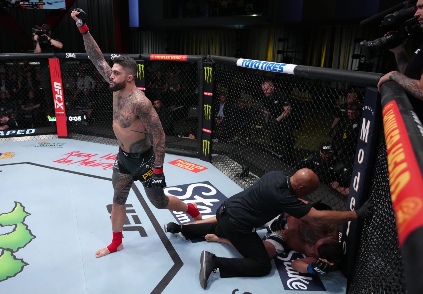 LAS VEGAS, NEVADA - APRIL 23: Tyson Pedro of Australia reacts after his victory over Ike Villanueva in a light heavyweight fight during the UFC Fight Night event at UFC APEX on April 23, 2022 in Las Vegas, Nevada. (Photo by Jeff Bottari/Zuffa LLC)