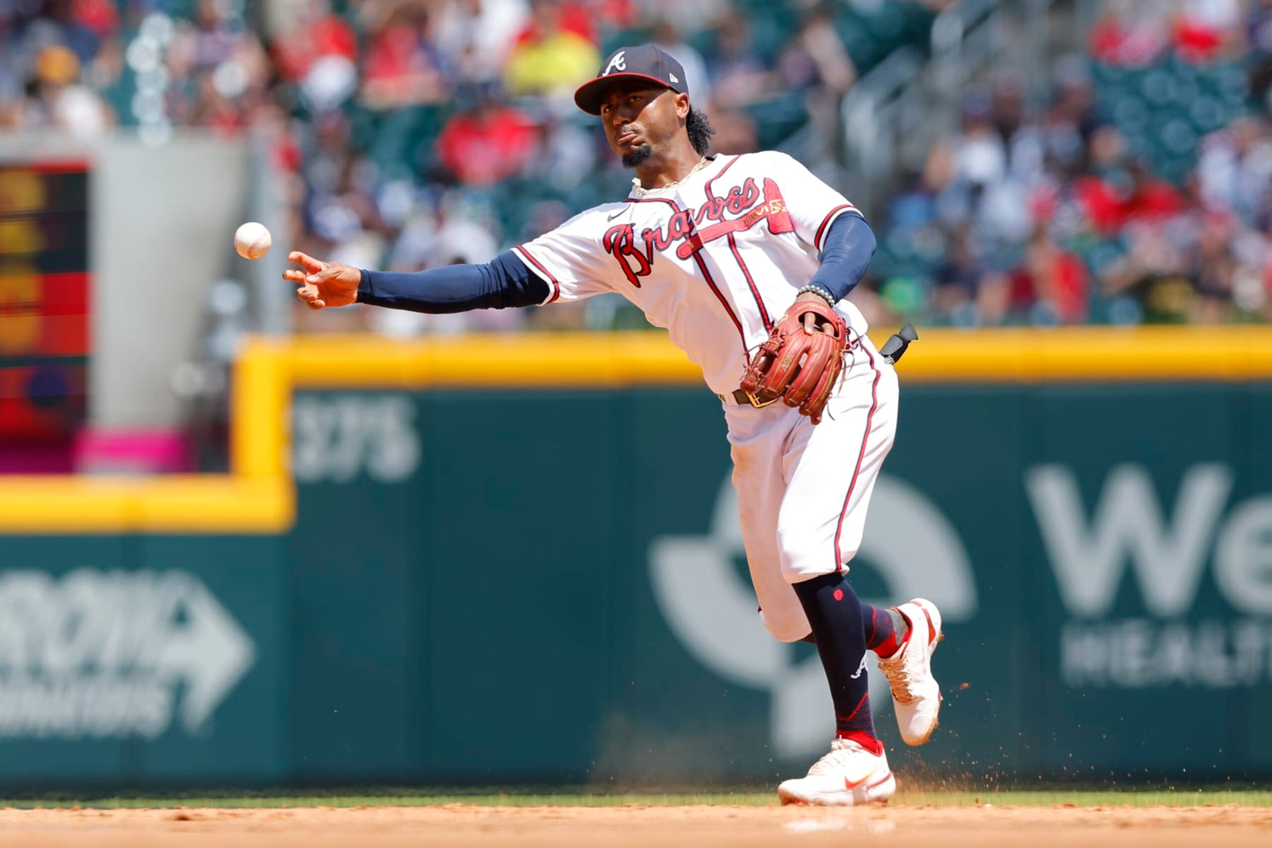 ATLANTA, GA - JUNE 12: Ozzie Albies #1 of the Atlanta Braves fields and throws to first during the sixth inning against the Pittsburgh Pirates at Truist Park on June 12, 2022 in Atlanta, Georgia. (Photo by Todd Kirkland/Getty Images)