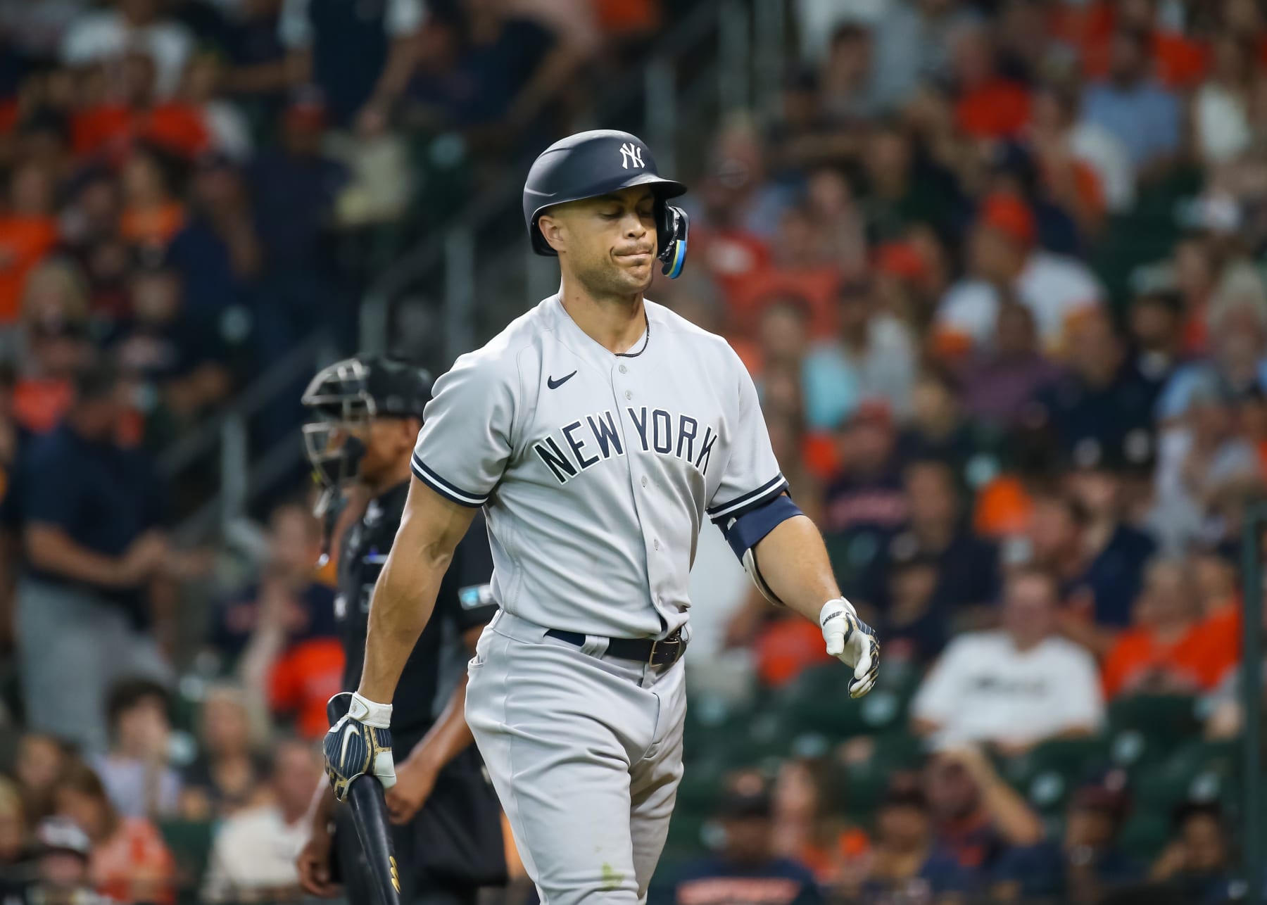 HOUSTON, TX - JULY 21:  New York Yankees left fielder Giancarlo Stanton (27) reacts after striking out in the top of the sixth inning during the MLB doubleheader Game 2 between the New York Yankees and Houston Astros on July 21, 2022 at Minute Maid Park in Houston, Texas.  (Photo by Leslie Plaza Johnson/Icon Sportswire via Getty Images)