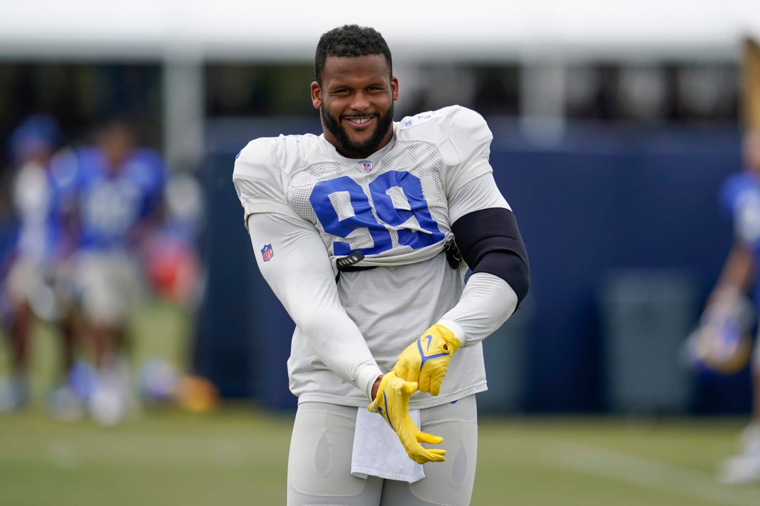 Los Angeles Rams defensive tackle Aaron Donald (99) participates in drills at the NFL football team's practice facility in Irvine, Calif. Thursday, Aug. 4, 2022. (AP Photo/Ashley Landis) Los Angeles Rams defensive tackle Aaron Donald (99) participates in drills at the NFL football team's practice facility in Irvine, Calif. Thursday, Aug. 4, 2022. (AP Photo/Ashley Landis)