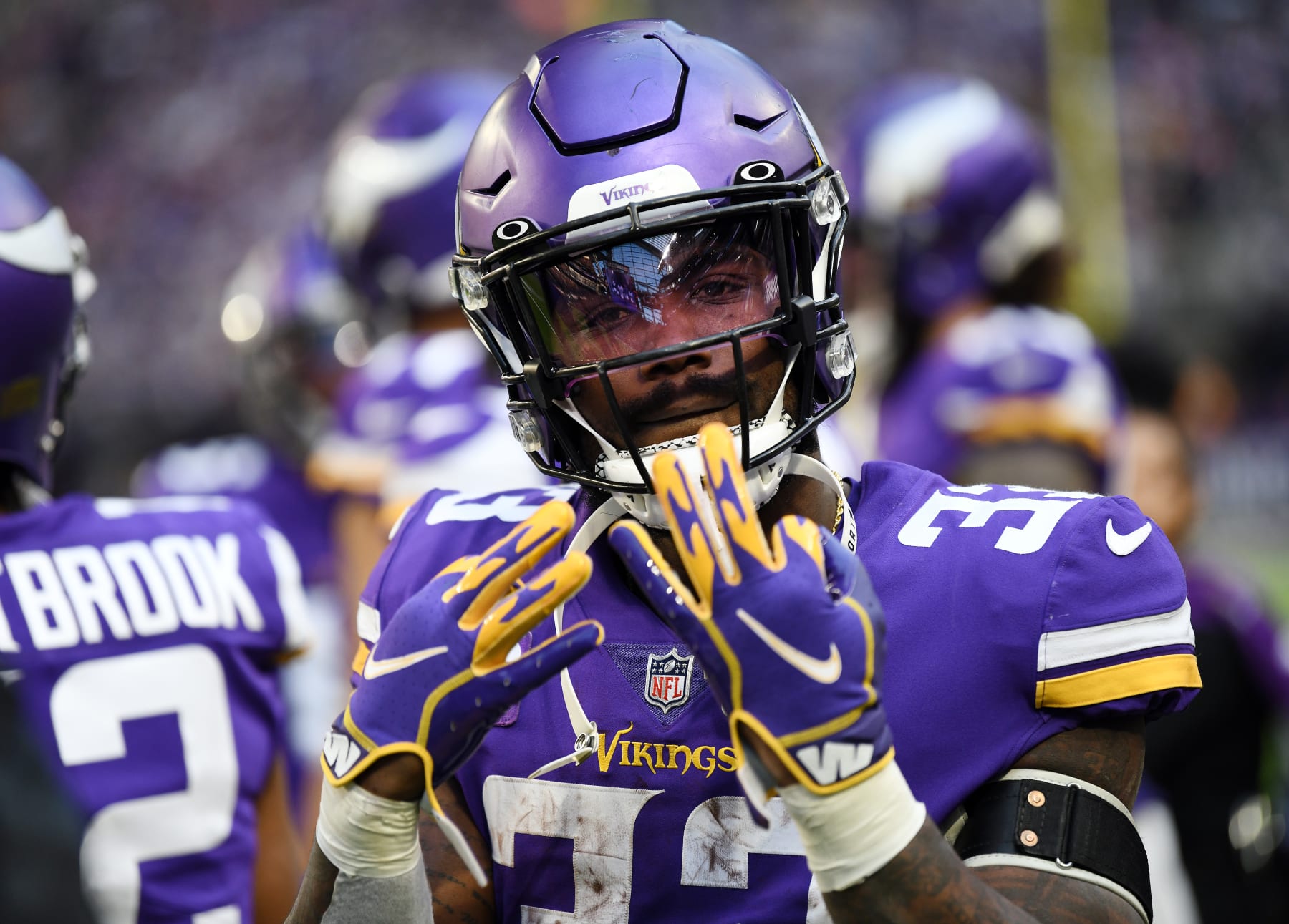 MINNEAPOLIS, MINNESOTA - JANUARY 09: Dalvin Cook #33 of the Minnesota Vikings poses on the sidelines during the game against the Chicago Bears at U.S. Bank Stadium on January 09, 2022 in Minneapolis, Minnesota. (Photo by Stephen Maturen/Getty Images)