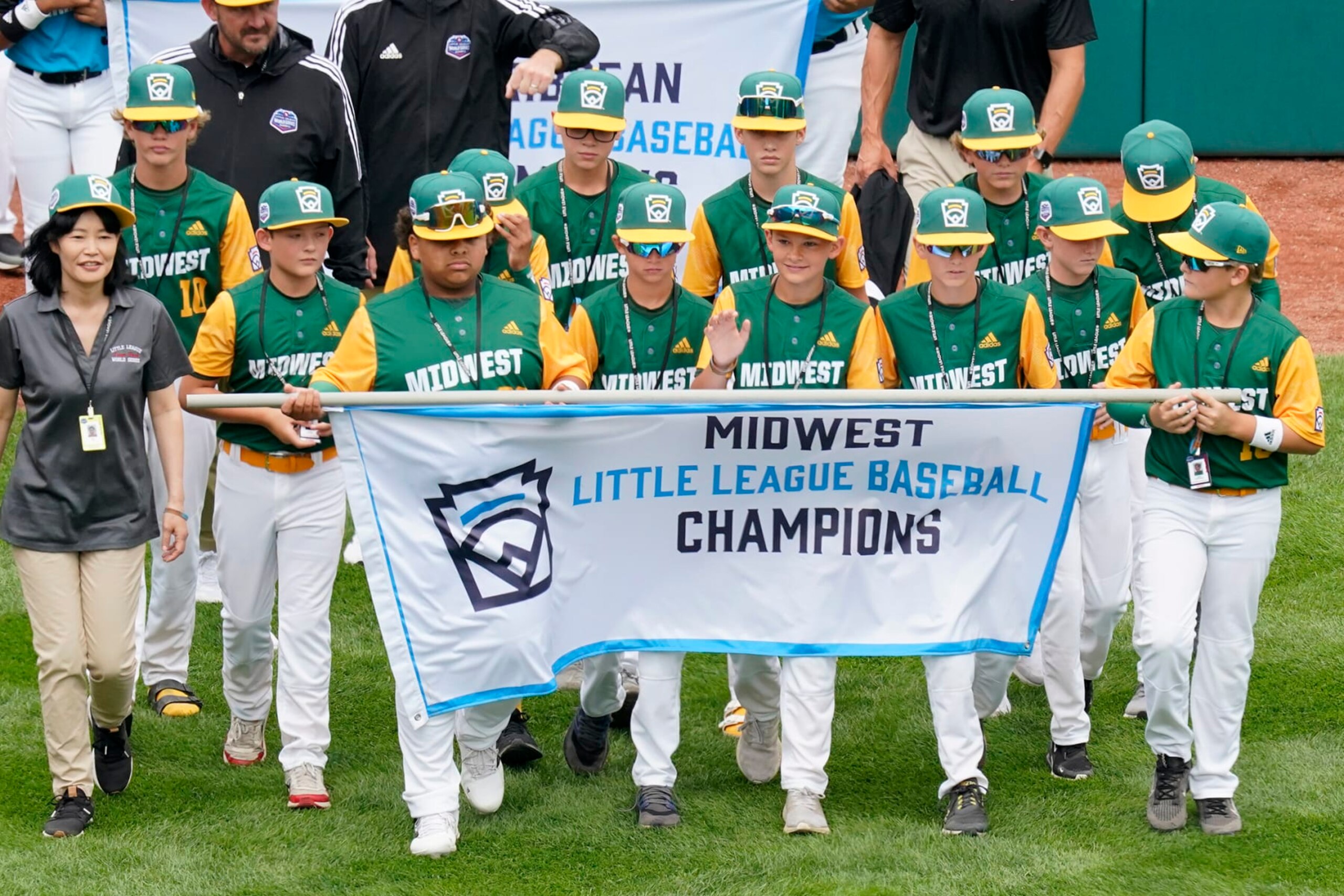 Midwest Region Champion Little League team from Davenport, Iowa, participates in the opening ceremony of the 2022 Little League World Series baseball tournament in South Williamsport, Pa., Wednesday, Aug 17, 2022. (AP Photo/Gene J. Puskar)