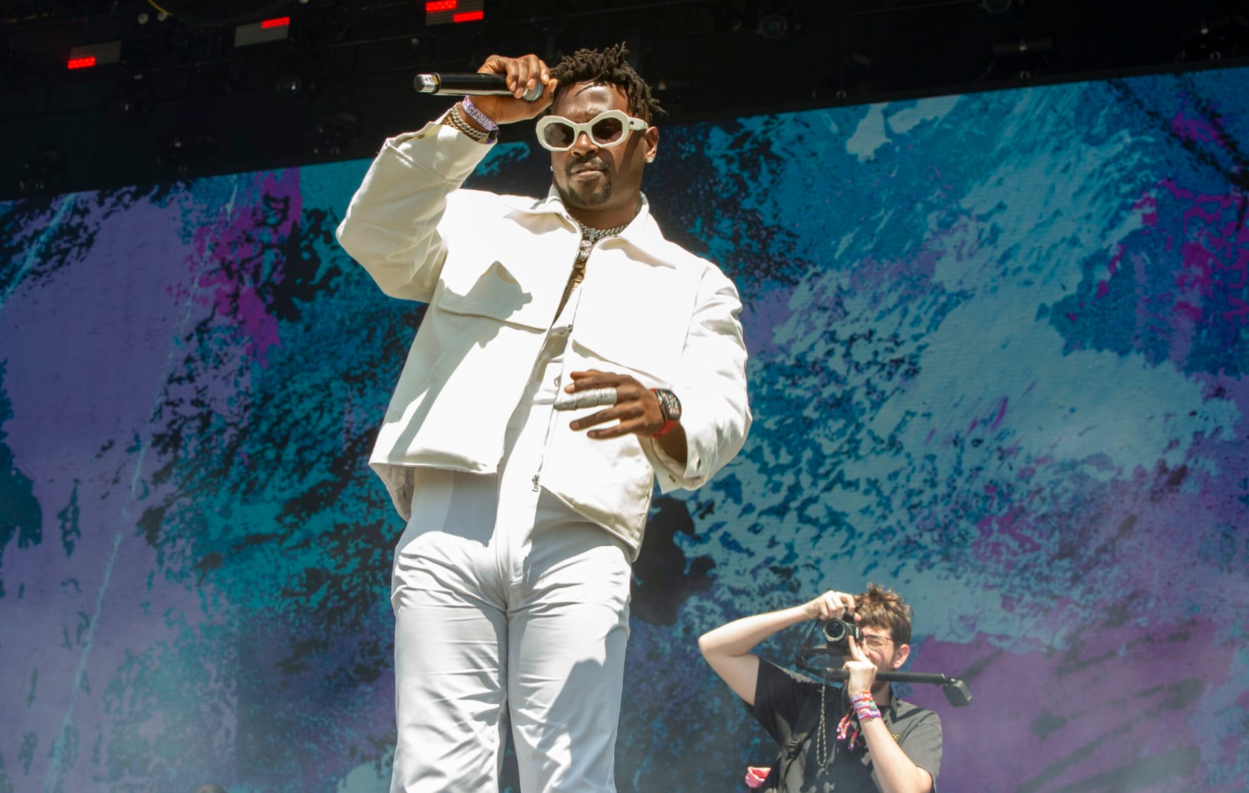 CHICAGO, ILLINOIS - JUNE 19: Professional football player Antonio Brown performs with GloUpJake at the Summer Smash Festival at Douglass Park on June 19, 2022 in Chicago, Illinois. (Photo by Barry Brecheisen/WireImage)