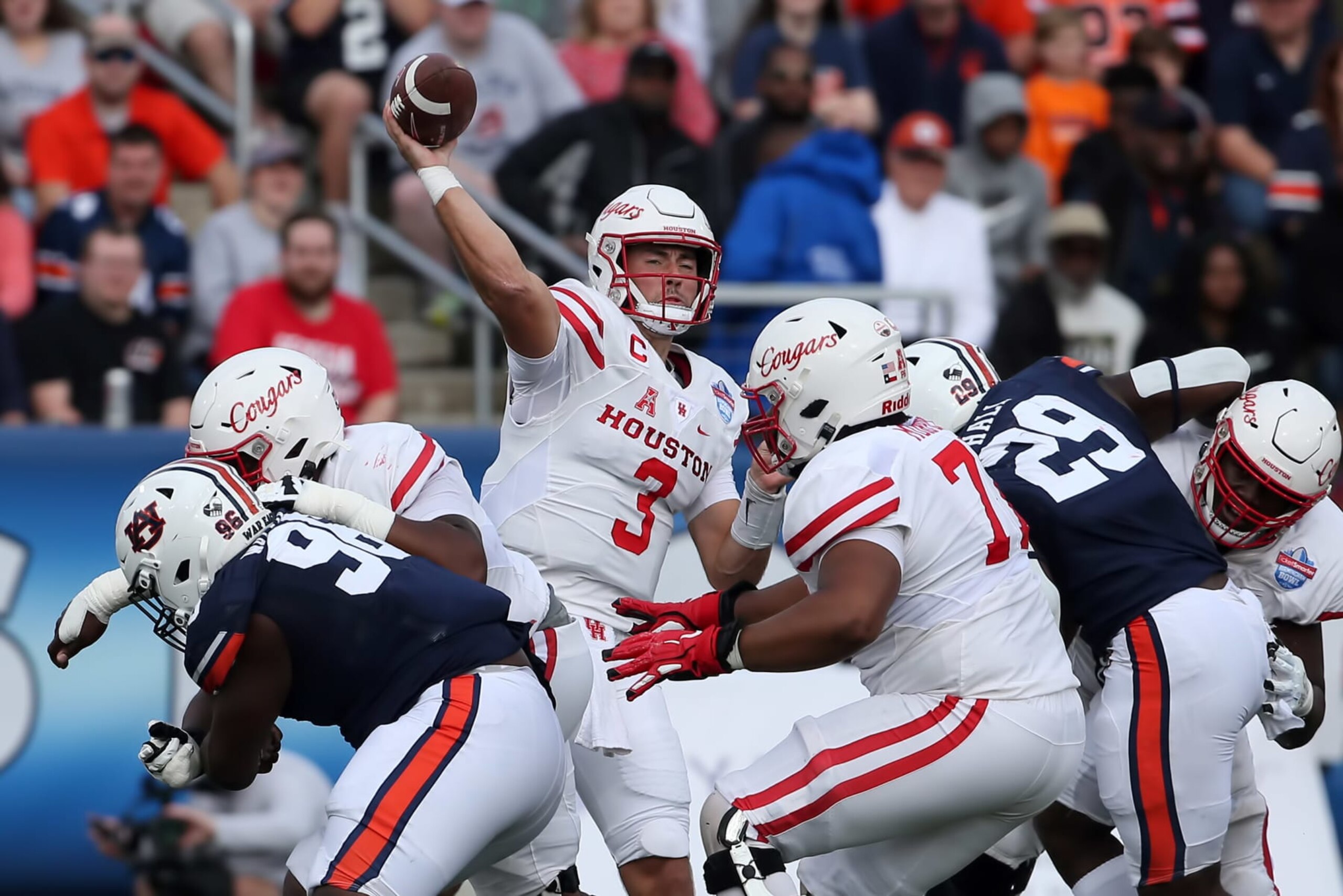BIRMINGHAM, AL - DECEMBER 28: Houston Cougars quarterback Clayton Tune (3) during the TicketSmarter Birmingham Bowl between the Houston Cougars and the Auburn Tigers on December 28, 2021 at Protective Stadium in Birmingham, Alabama. (Photo by Michael Wade/Icon Sportswire via Getty Images) BIRMINGHAM, AL - DECEMBER 28: Houston Cougars quarterback Clayton Tune (3) during the TicketSmarter Birmingham Bowl between the Houston Cougars and the Auburn Tigers on December 28, 2021 at Protective Stadium in Birmingham, Alabama. (Photo by Michael Wade/Icon Sportswire via Getty Images)