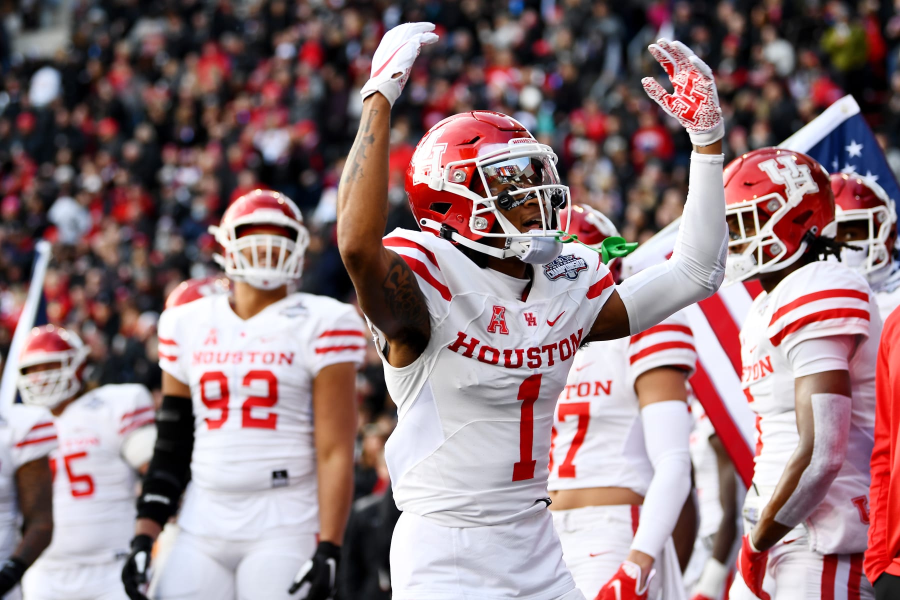 CINCINNATI, OHIO - DECEMBER 04: Nathaniel Dell #1 of the Houston Cougars reacts as the team prepares to run onto the field for the first half of the 2021 American Conference Championship against the Cincinnati Bearcats at Nippert Stadium on December 04, 2021 in Cincinnati, Ohio. (Photo by Emilee Chinn/Getty Images)