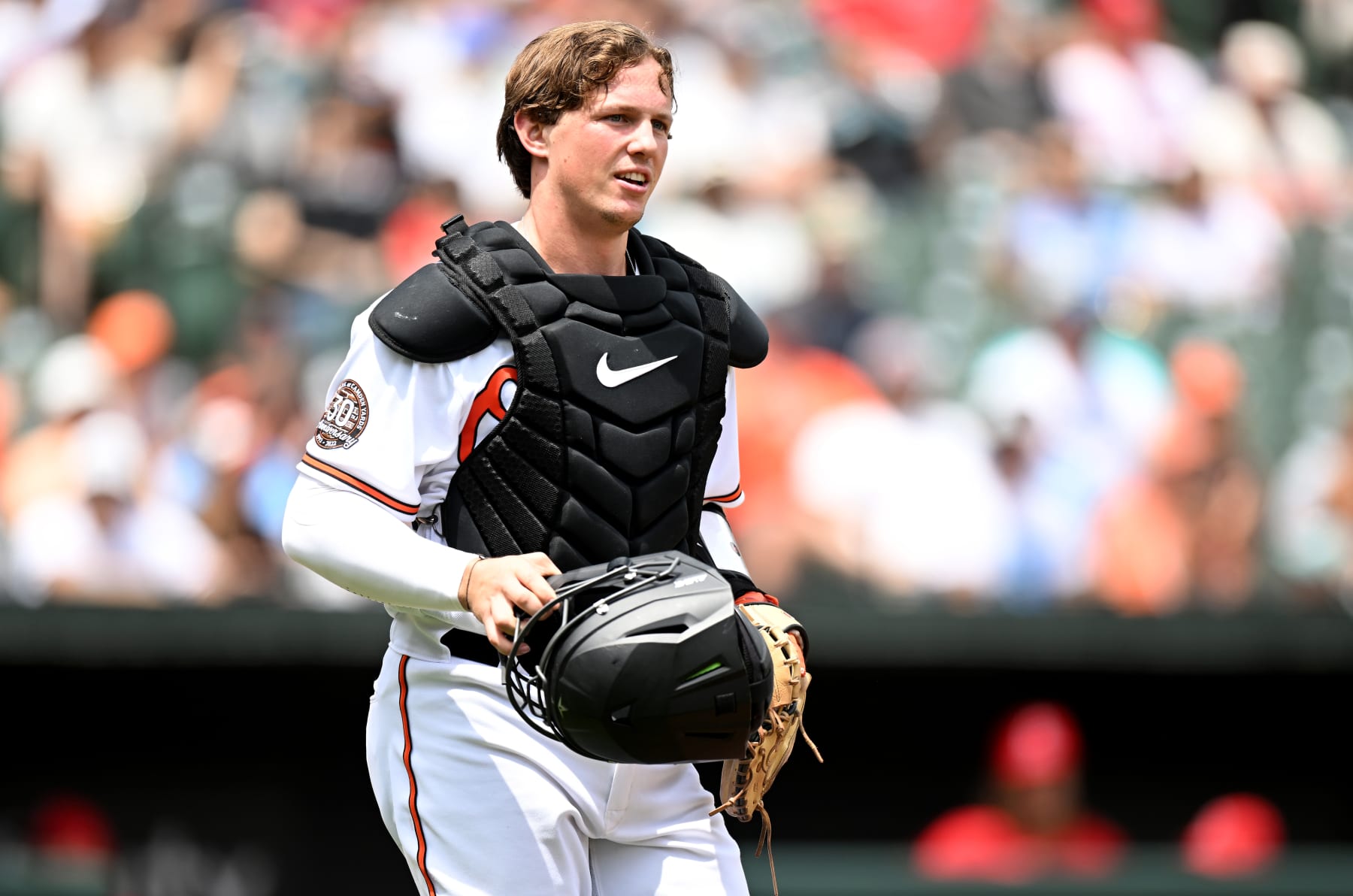 BALTIMORE, MARYLAND - JULY 10: Adley Rutschman #35 of the Baltimore Orioles catches against the Los Angeles Angels at Oriole Park at Camden Yards on July 10, 2022 in Baltimore, Maryland. (Photo by G Fiume/Getty Images)