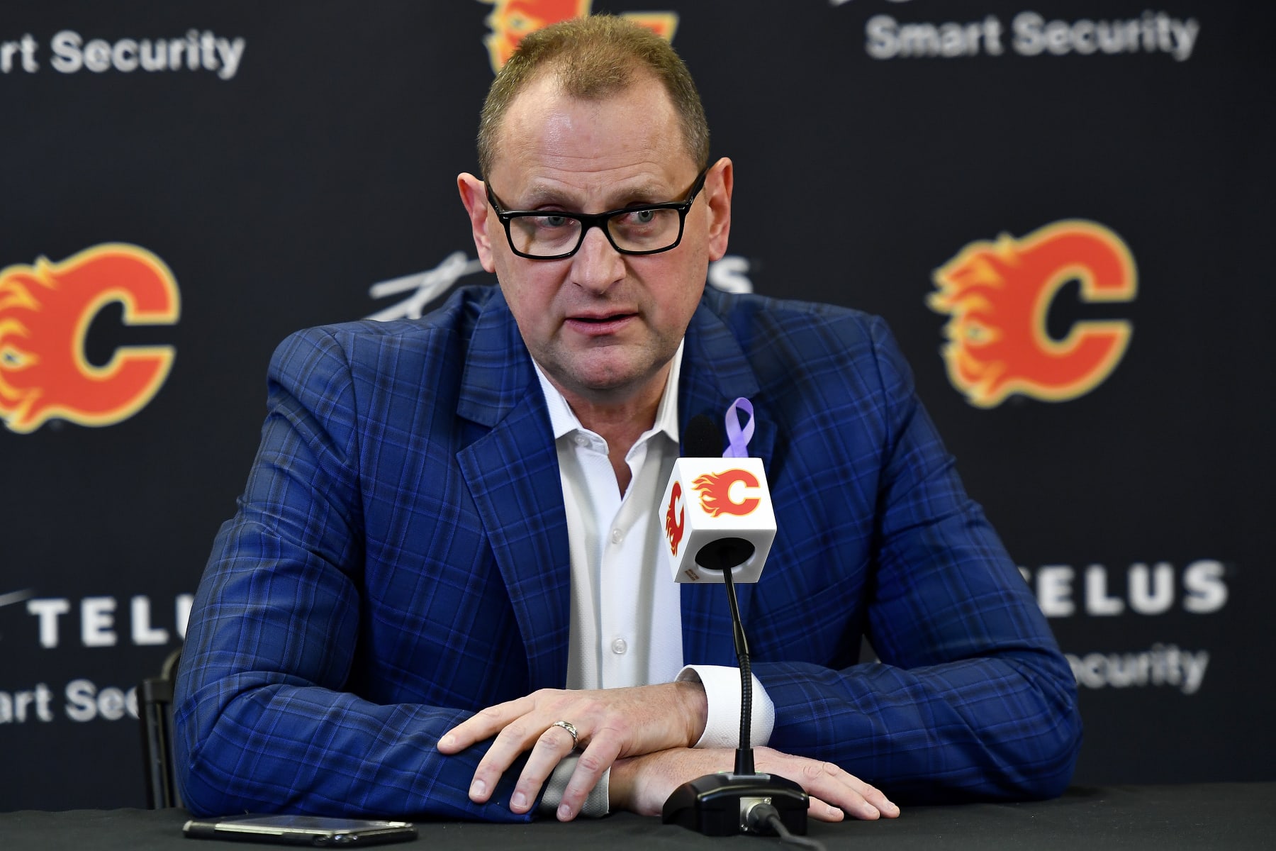 CALGARY, ALBERTA - MARCH 16: MARCH 16: GM Brad Treliving of the Calgary Flames addresses the media after acquiring Calle Jarnkrok from the Seattle Kraken before the game against the New Jersey Devils at Scotiabank Saddledome on March 16, 2022 in Calgary, Alberta.  (Photo by Terence Leung/NHLI via Getty Images)