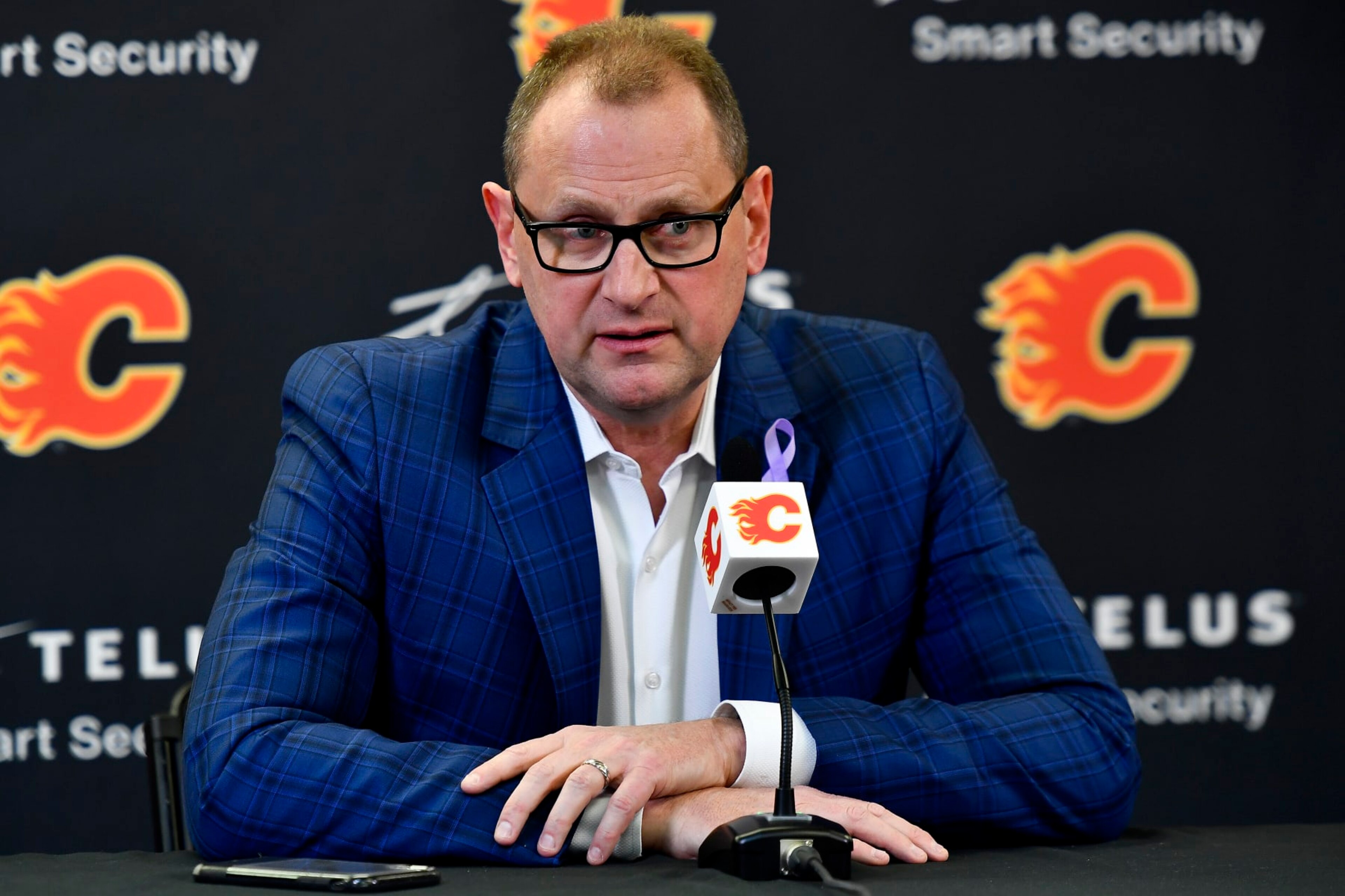 CALGARY, ALBERTA - MARCH 16: MARCH 16: GM Brad Treliving of the Calgary Flames addresses the media after acquiring Calle Jarnkrok from the Seattle Kraken before the game against the New Jersey Devils at Scotiabank Saddledome on March 16, 2022 in Calgary, Alberta. (Photo by Terence Leung/NHLI via Getty Images) CALGARY, ALBERTA - MARCH 16: MARCH 16: GM Brad Treliving of the Calgary Flames addresses the media after acquiring Calle Jarnkrok from the Seattle Kraken before the game against the New Jersey Devils at Scotiabank Saddledome on March 16, 2022 in Calgary, Alberta. (Photo by Terence Leung/NHLI via Getty Images)