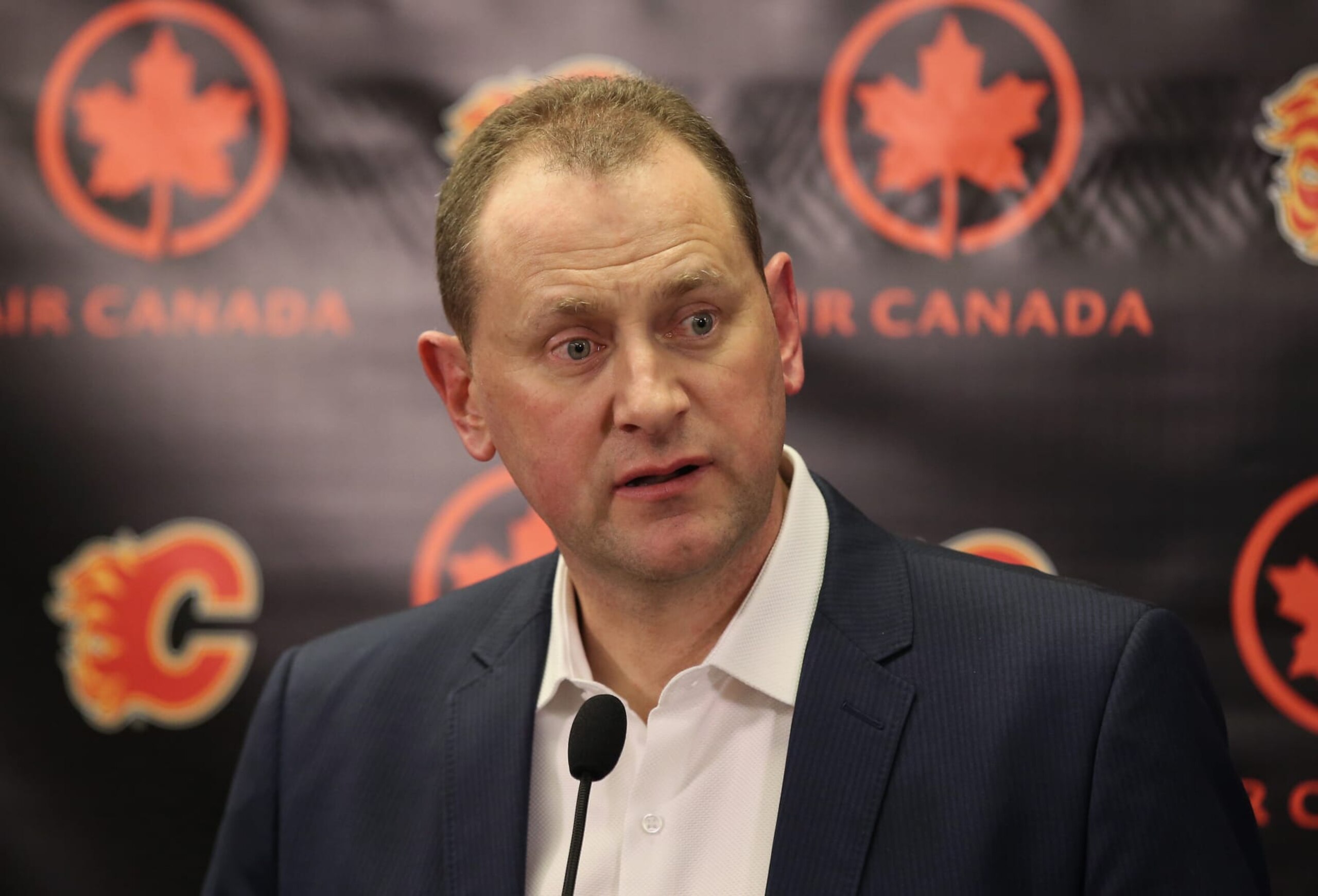 CALGARY, CANADA - FEBRUARY 27: General manager Brad Treliving of the Calgary Flames addresses the media before the trade deadline prior to the teamâs NHL game against the Ottawa Senators at the Scotiabank Saddledome on February 27, 2016 in Calgary, Alberta, Canada. (Photo by Tom Szczerbowski/Getty Images)