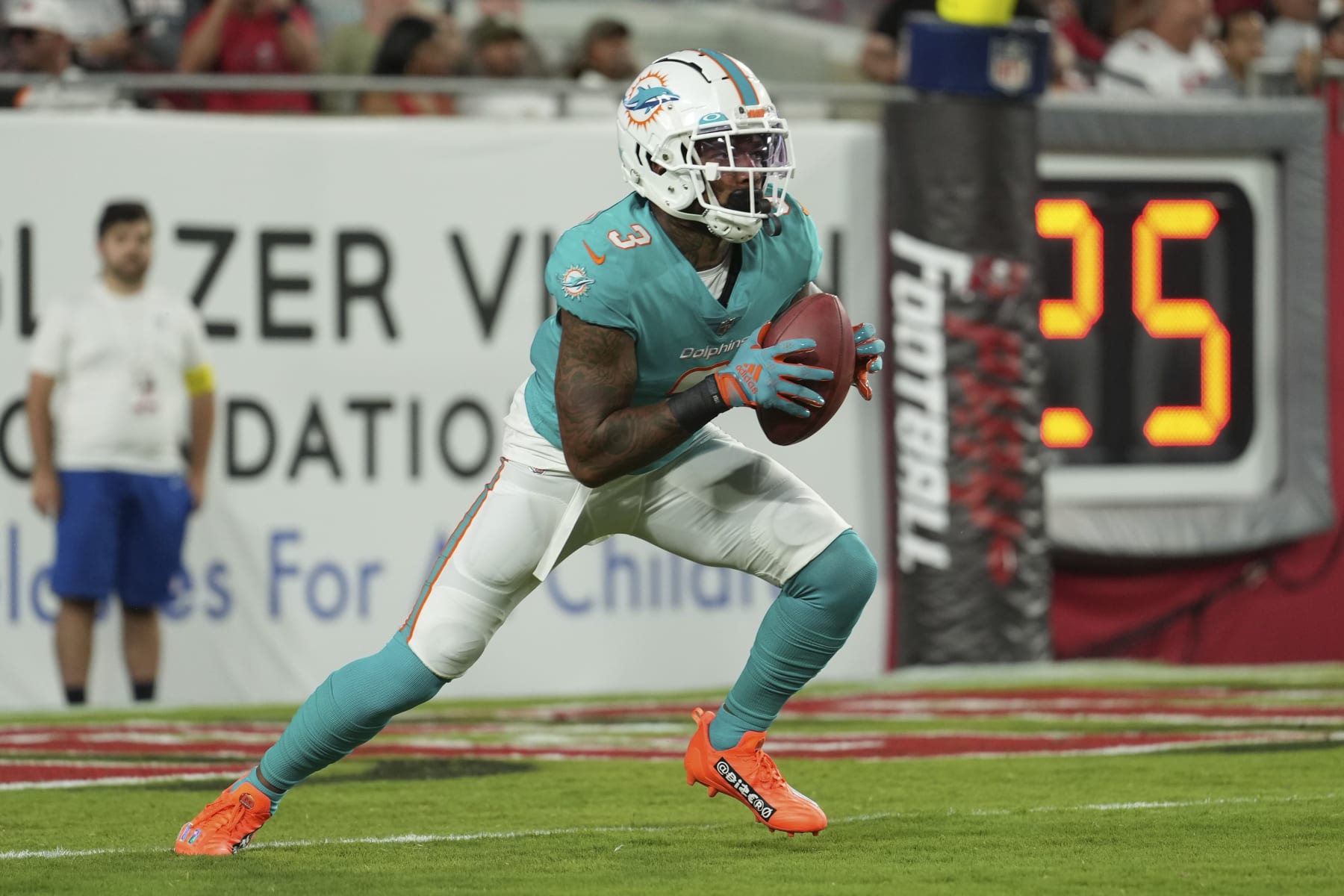 Miami Dolphins wide receiver Lynn Bowden Jr. (3) returns a kick off during an NFL football game against the Tampa Bay Buccaneers, Saturday, August 13, 2022 in Tampa, FL. The Dolphins defeat the Buccaneers 26-24. (Peter Joneleit via AP)