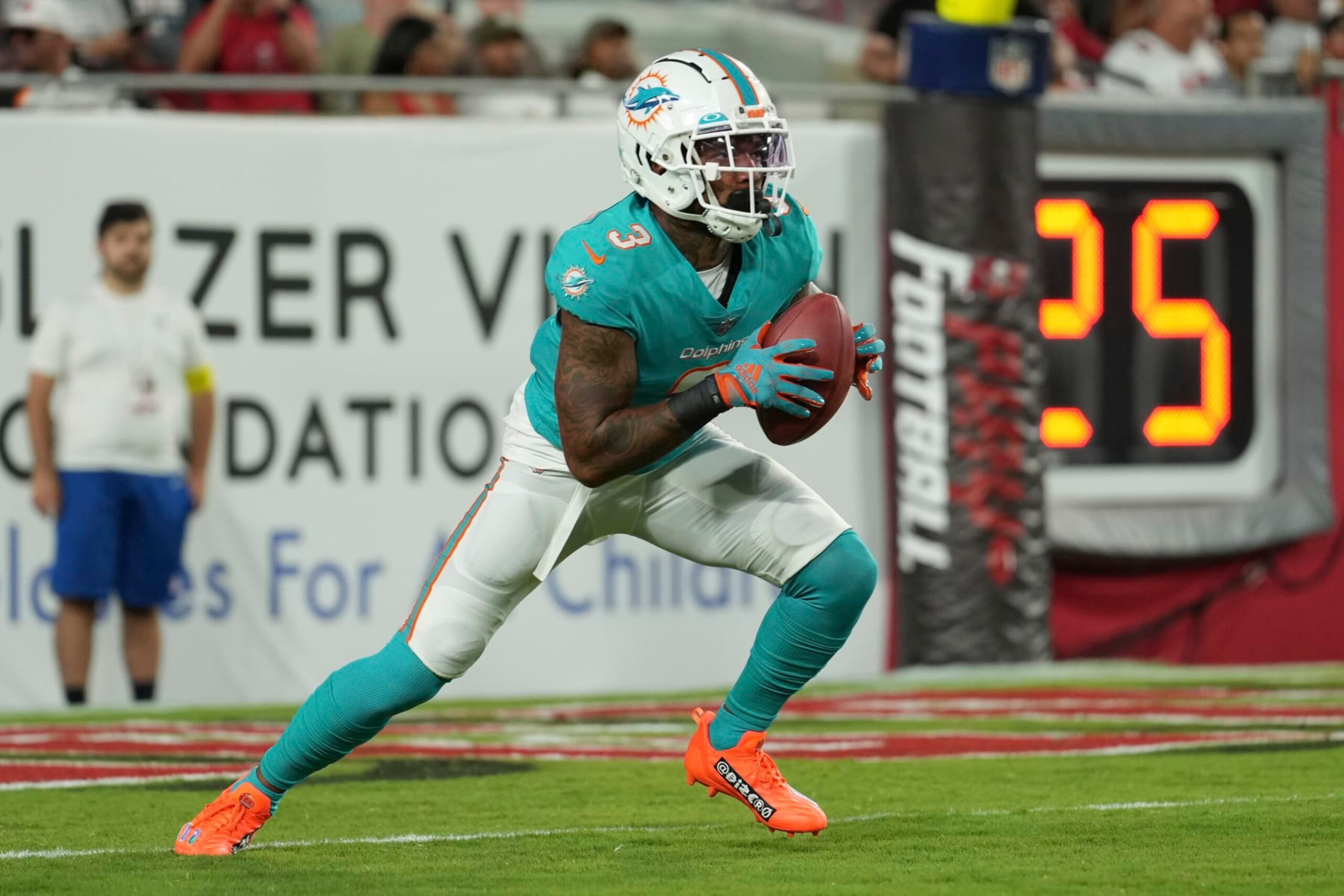 Miami Dolphins wide receiver Lynn Bowden Jr. (3) returns a kick off during an NFL football game against the Tampa Bay Buccaneers, Saturday, August 13, 2022 in Tampa, FL. The Dolphins defeat the Buccaneers 26-24. (Peter Joneleit via AP)