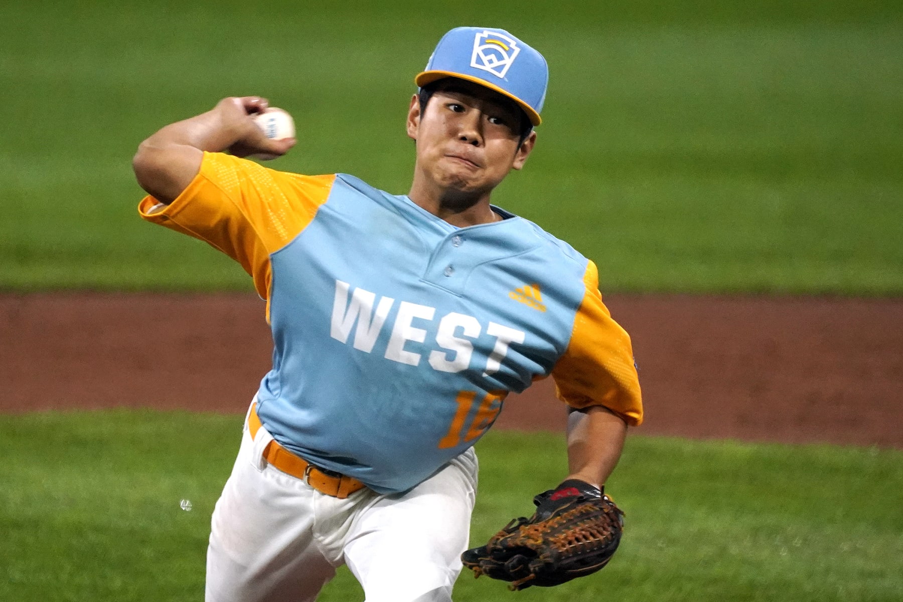 Honolulu's Cohen Sakamoto delivers during the first inning of the team's baseball game against Bonney Lake Wash., at the Little League World Series in South Williamsport, Pa., Wednesday, Aug. 17, 2022. (AP Photo/Gene J. Puskar)