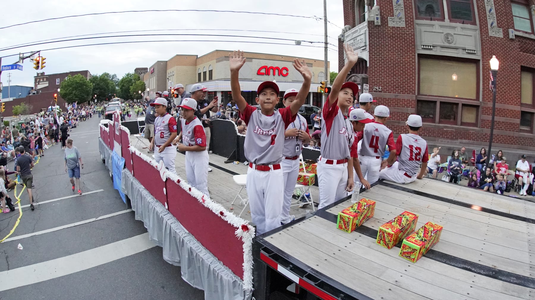 Japan Region Champion Little League team from Takarazuka, Hyogo, rides in the Little League Grand Slam Parade in downtown Williamsport, Pa., on Monday, Aug. 15, 2022. The Little League World Series baseball tournament, featuring 20 teams from around the world, starts on August 17, 2022 in South Williamsport, Pa. (AP Photo/Gene J. Puskar)