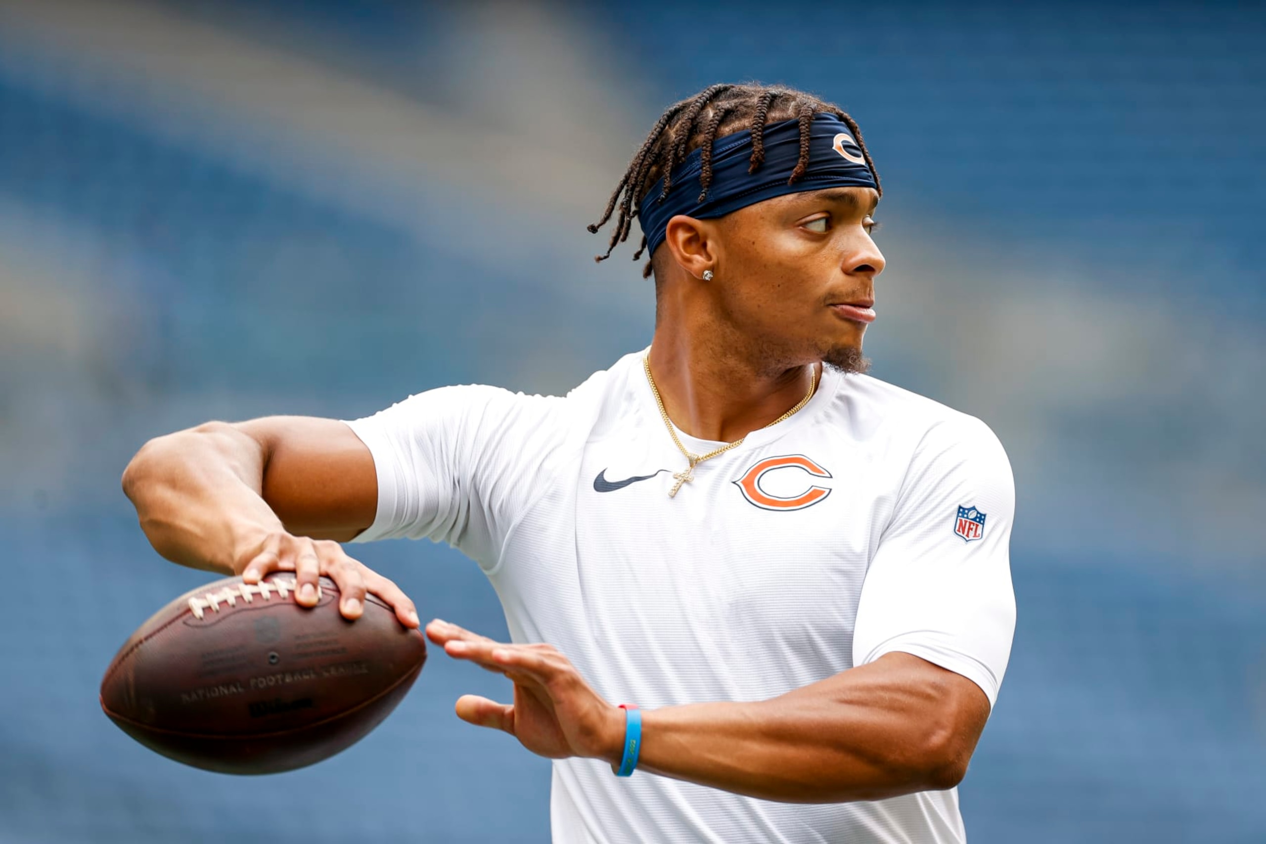 SEATTLE, WASHINGTON - AUGUST 18: Justin Fields #1 of the Chicago Bears warms up prior to the preseason game against the Seattle Seahawks at Lumen Field on August 18, 2022 in Seattle, Washington. (Photo by Steph Chambers/Getty Images)