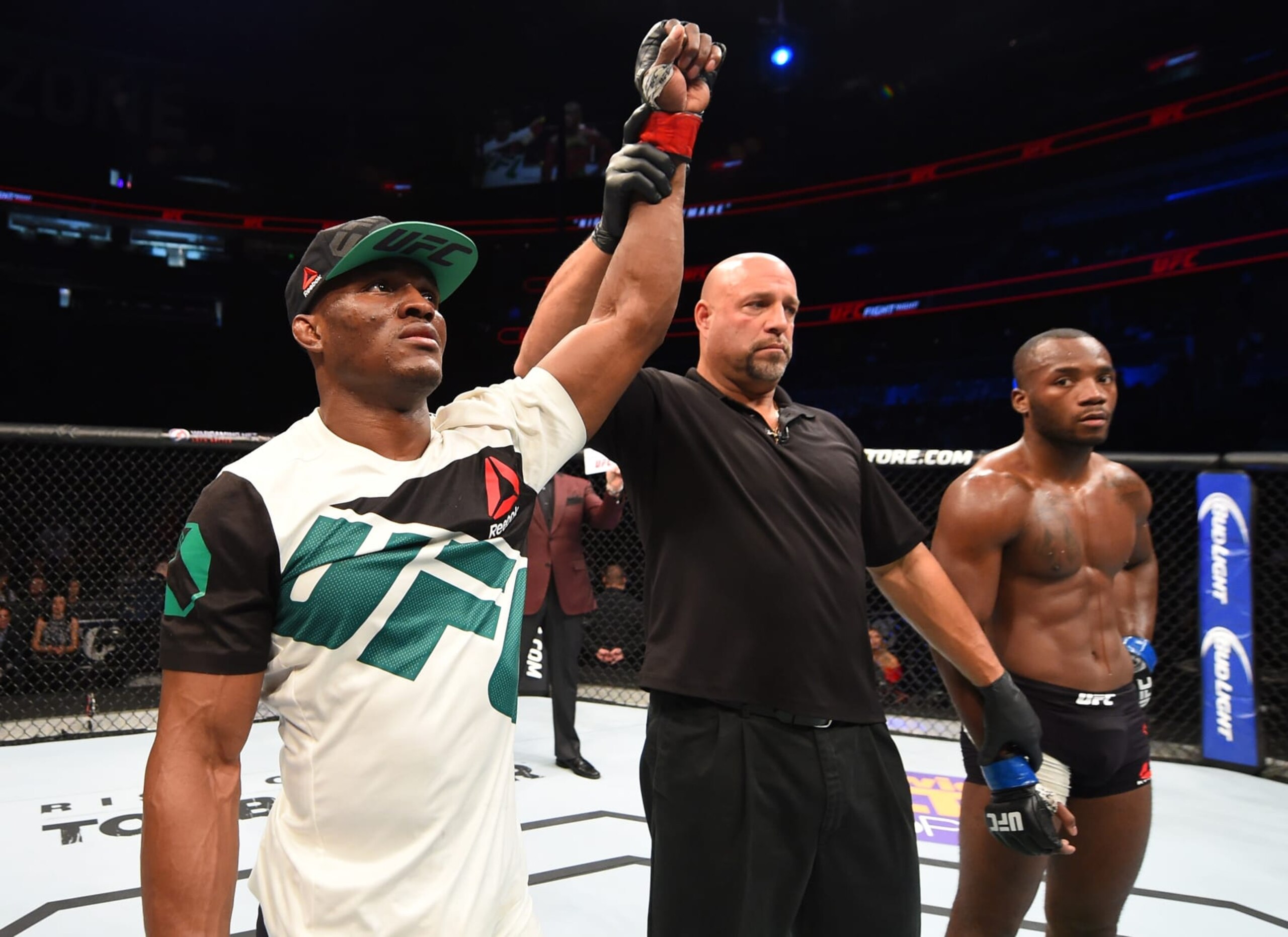 ORLANDO, FL - DECEMBER 19:   (L-R) Kamaru Usman celebrates his victory over Leon Edwards in their welterweight bout during the UFC Fight Night event at the Amway Center on December 19, 2015 in Orlando, Florida. (Photo by Josh Hedges/Zuffa LLC/Zuffa LLC via Getty Images)