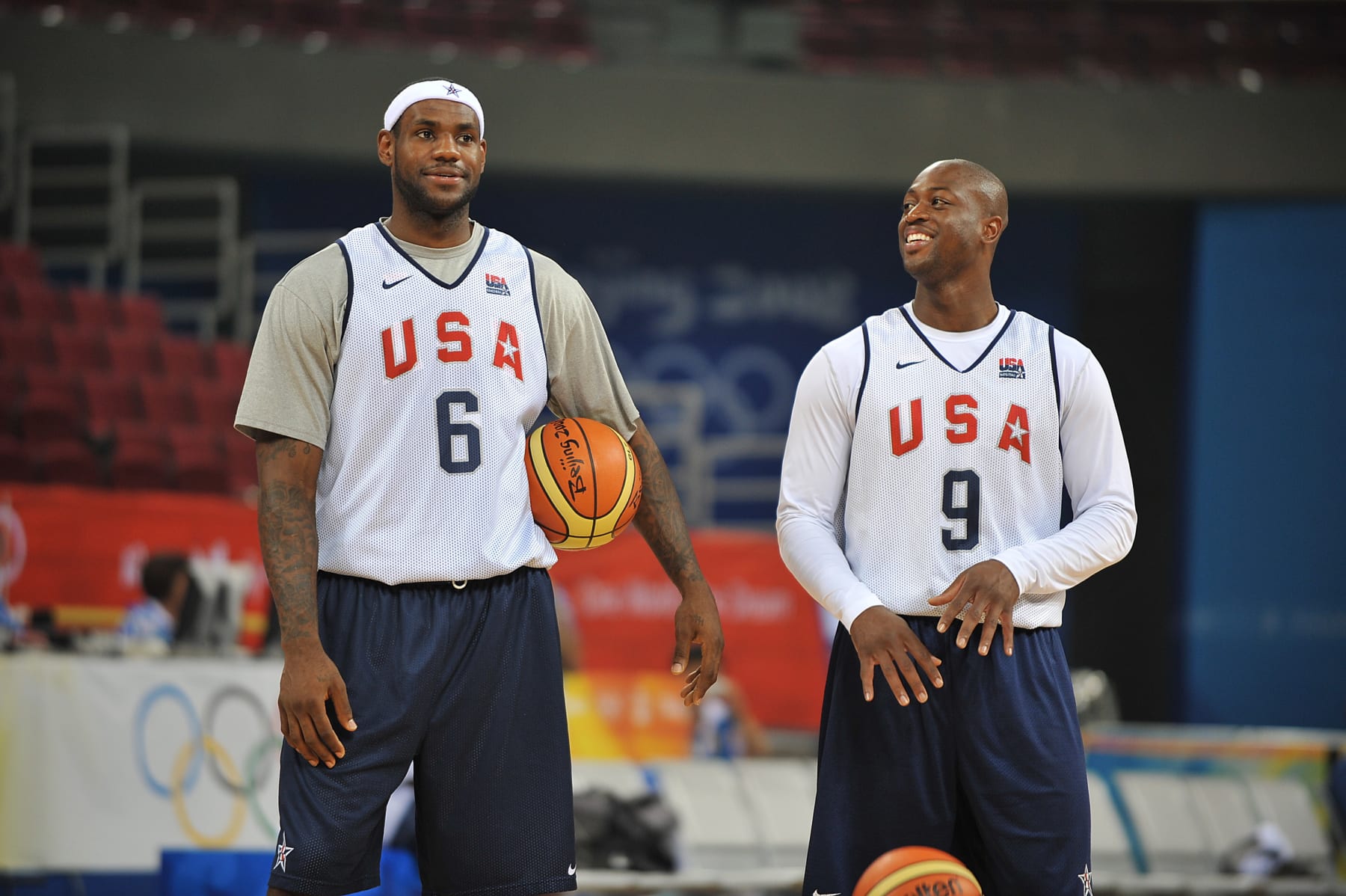 BEIJING - AUGUST 7:  LeBron James #6 and Dwyane Wade #9 of the U.S. Men's Senior National Team talk during practice prior to the 2008 Beijing Summer Olympics on August 7, 2008 at Wukesong Indoor Stadium in Beijing, China. NOTE TO USER: User expressly acknowledges and agrees that, by downloading and/or using this Photograph, user is consenting to the terms and conditions of the Getty Images License Agreement. Mandatory Copyright Notice: Copyright 2008 NBAE (Photo by Garrett Ellwood/NBAE via Getty Images)