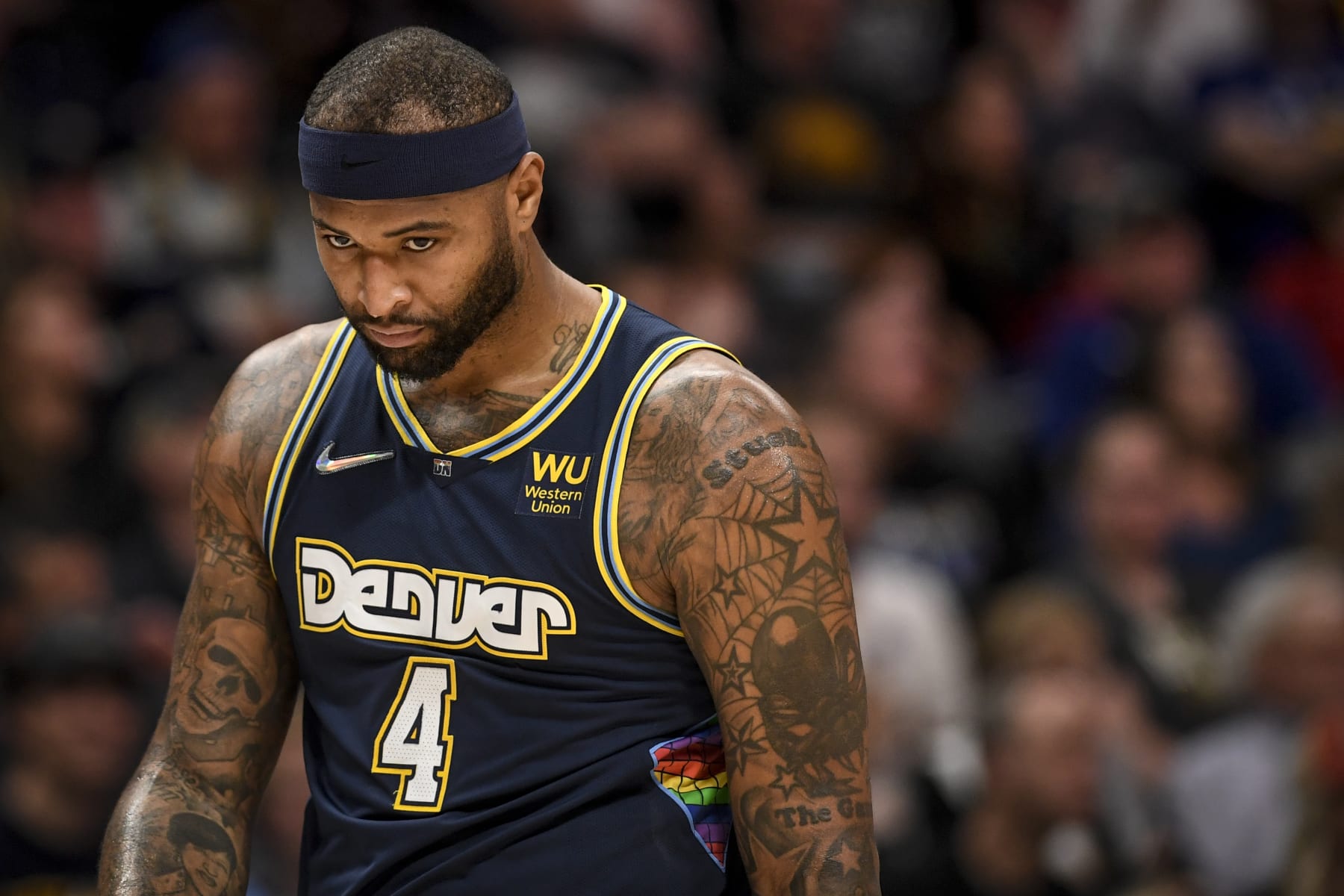 DENVER, CO - APRIL 24: DeMarcus Cousins (4) of the Denver Nuggets reacts to being called for fouling Andrew Wiggins (22) of the Golden State Warriors during the second quarter at Ball Arena on Sunday, April 24, 2022. (Photo by AAron Ontiveroz/MediaNews Group/The Denver Post via Getty Images)