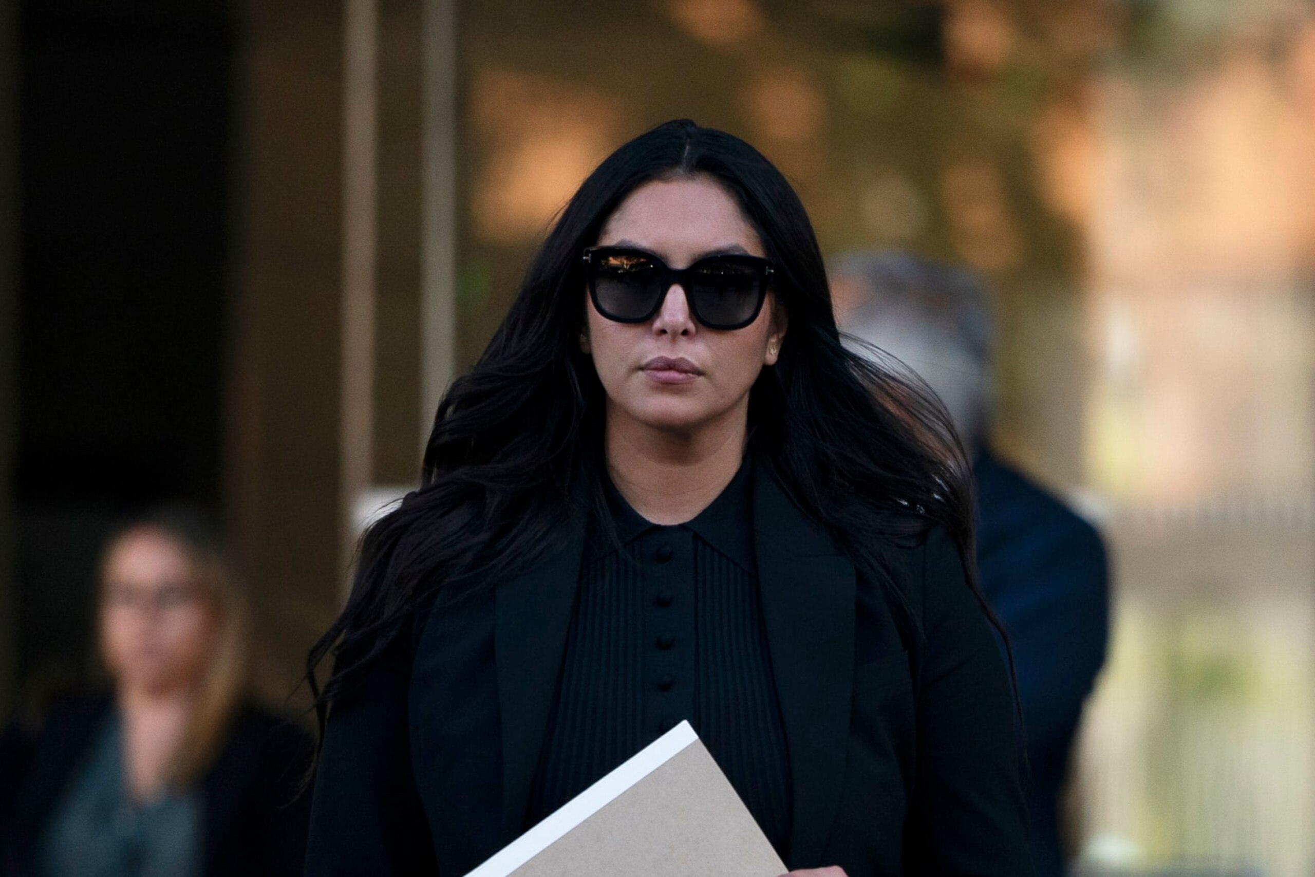 Vanessa Bryant, the widow of Kobe Bryant, leaves a federal courthouse in Los Angeles, Wednesday, Aug. 10, 2022. Kobe Bryant's widow is taking her lawsuit against the Los Angeles County sheriff's and fire departments to a federal jury, seeking compensation for photos deputies shared of the remains of the NBA star, his daughter and seven others killed in a helicopter crash in 2020. (AP Photo/Jae C. Hong)