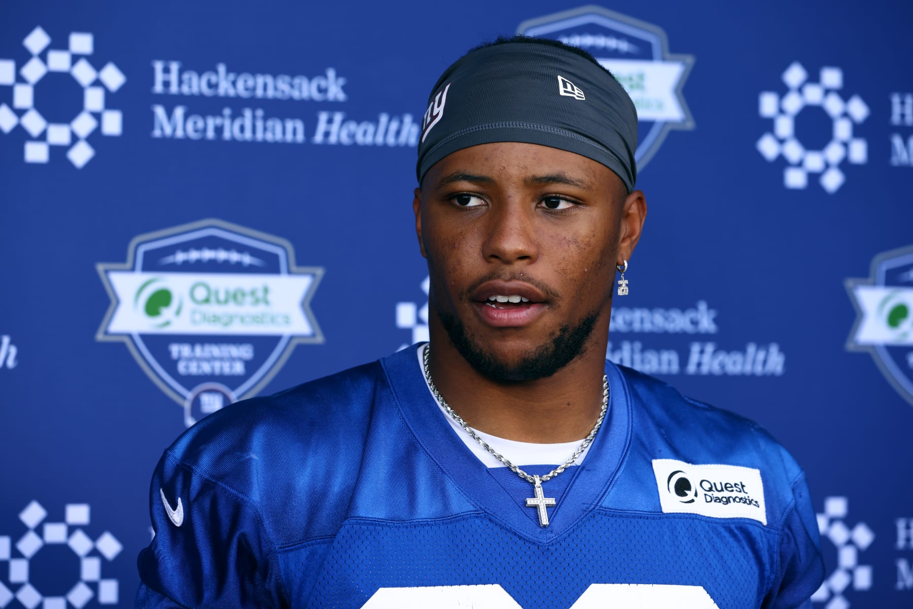 EAST RUTHERFORD, NJ - JUNE 08: Running back Saquon Barkley #26 of the New York Giants talks to the media after the team's mandatory minicamp at Quest Diagnostics Training Center on June 8, 2022 in East Rutherford, New Jersey. (Photo by Rich Schultz/Getty Images)