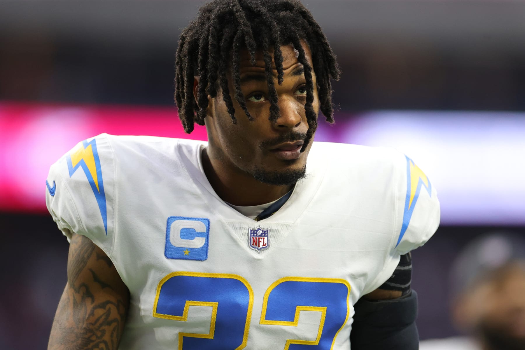 HOUSTON, TEXAS - DECEMBER 26: Derwin James #33 of the Los Angeles Chargers looks on against the Houston Texans at NRG Stadium on December 26, 2021 in Houston, Texas. (Photo by Carmen Mandato/Getty Images)