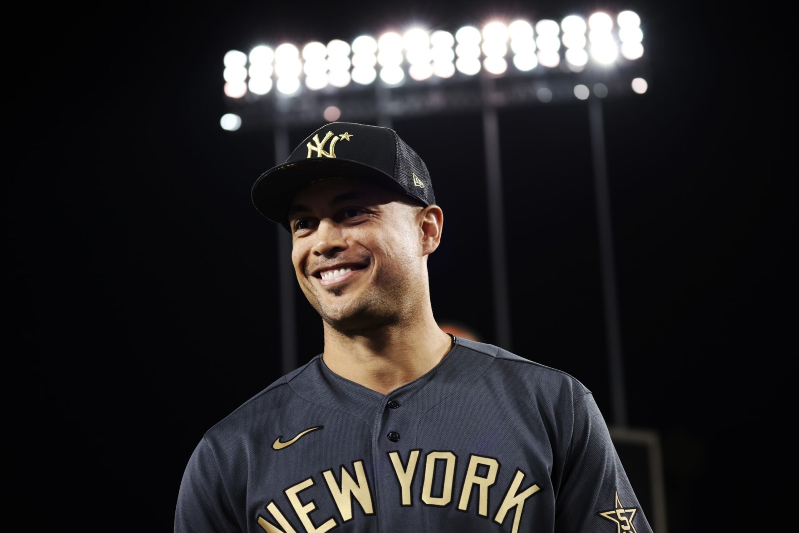 LOS ANGELES, CA - JULY 19:  Giancarlo Stanton #27 of the New York Yankees smiles as he is presented with the Ted Williams MVP trophy after the 92nd MLB All-Star Game presented by Mastercard at Dodger Stadium on Tuesday, July 19, 2022 in Los Angeles, California. (Photo by Mary DeCicco/MLB Photos via Getty Images)