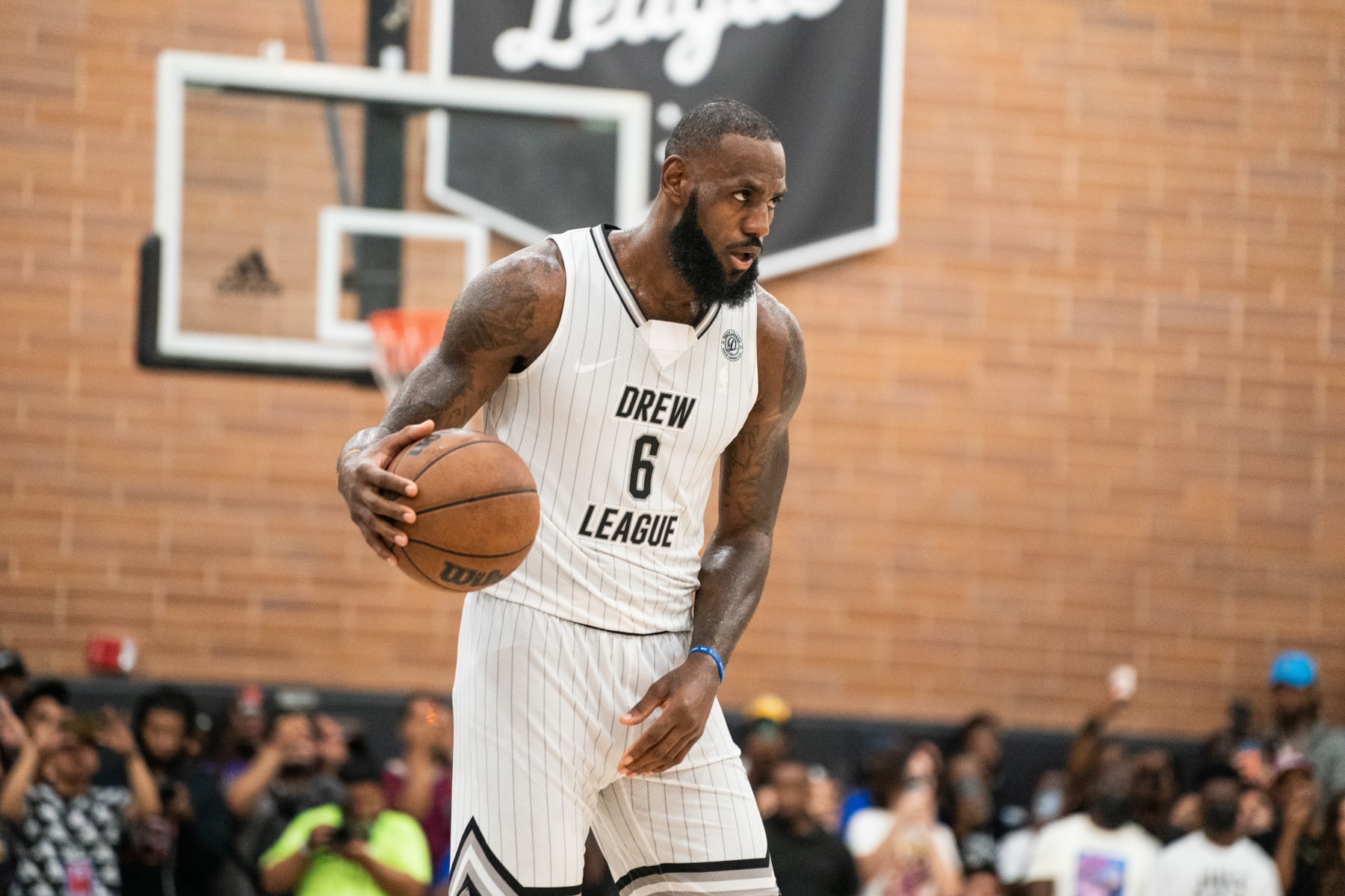 LOS ANGELES, CALIFORNIA - JULY 16: LeBron James handles the ball at the Drew League Pro-Am on July 16, 2022 in Los Angeles, California. (Photo by Cassy Athena/Getty Images)