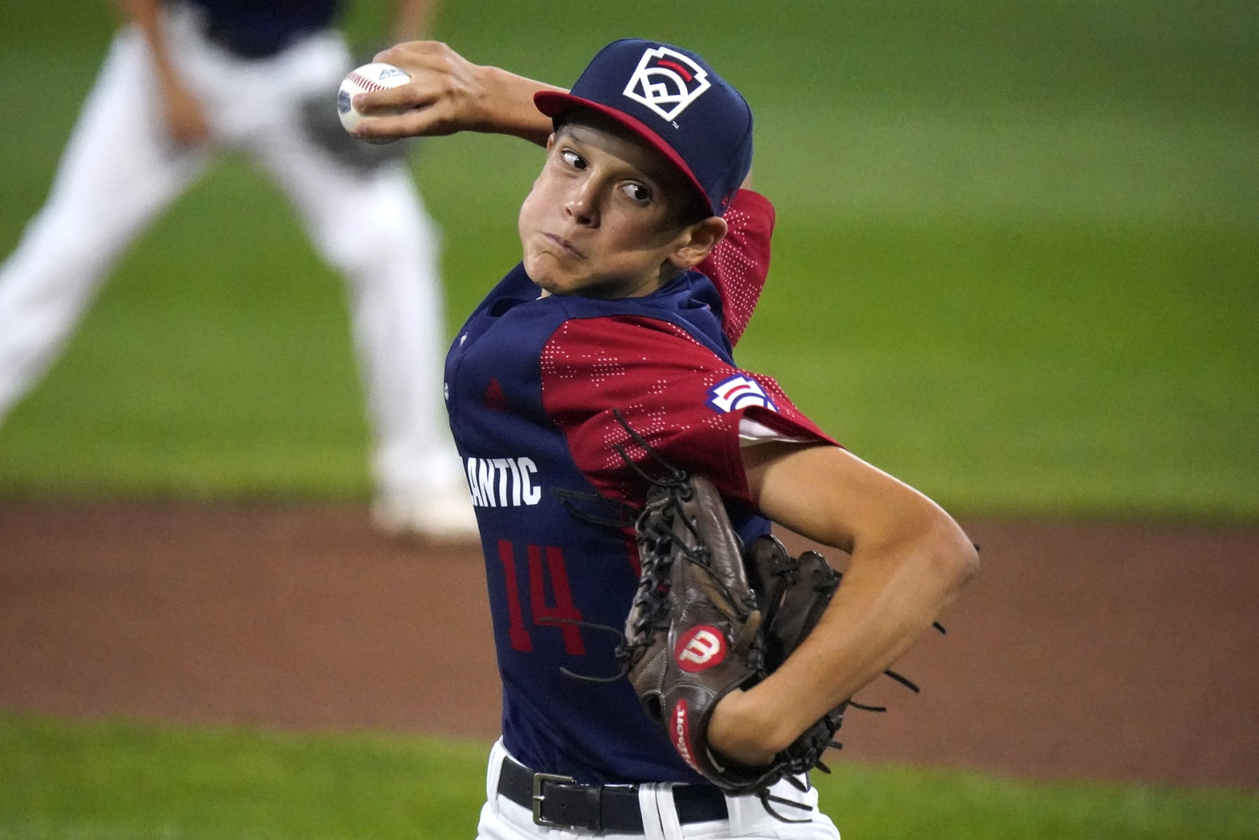 Hollidaysburg, Pa.'s Brody Dull delivers during the first inning of a baseball game against Pearland, Texas, at the Little League World Series in South Williamsport, Pa., Thursday, Aug. 18, 2022. (AP Photo/Gene J. Puskar)