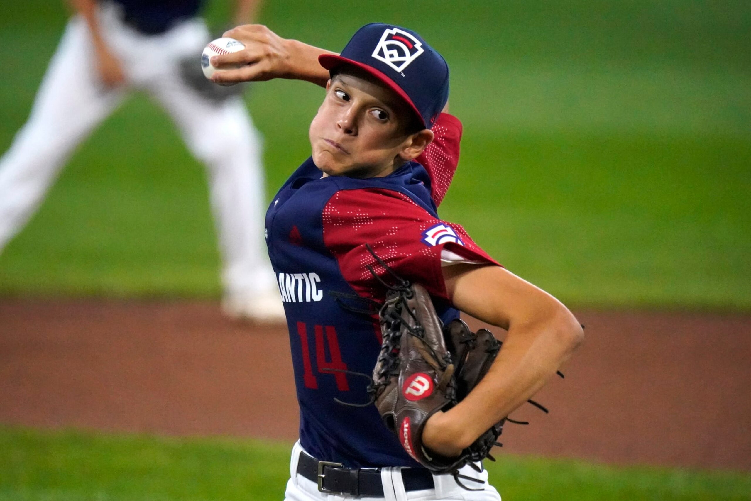 Hollidaysburg, Pa.'s Brody Dull delivers during the first inning of a baseball game against Pearland, Texas, at the Little League World Series in South Williamsport, Pa., Thursday, Aug. 18, 2022. (AP Photo/Gene J. Puskar)