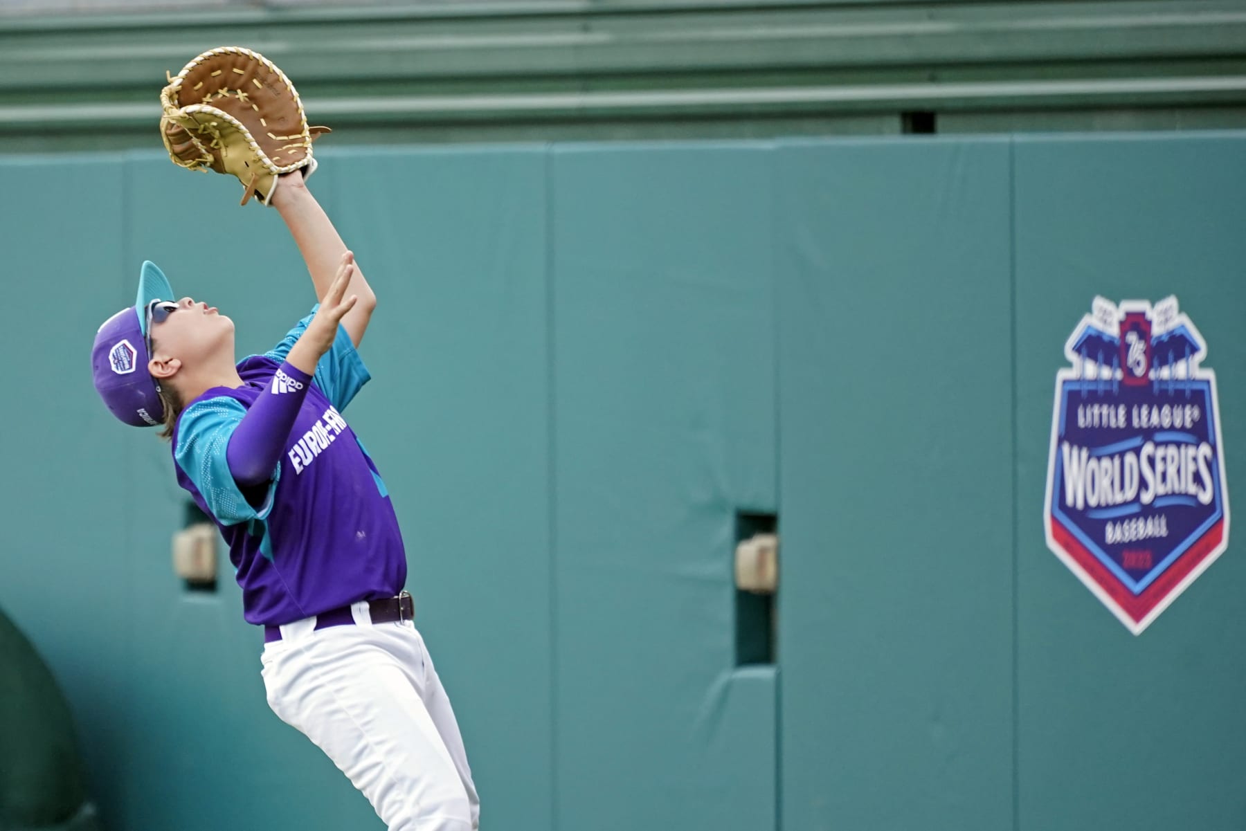 Italy first baseman Jacopo Bussolati (15) catches a ball in foul territory hit by Taiwan's Chen Yu-Ting during the fourth inning of a baseball game at the Little League World Series tournament in South Williamsport, Pa., Thursday, Aug. 18, 2022. (AP Photo/Tom E. Puskar)