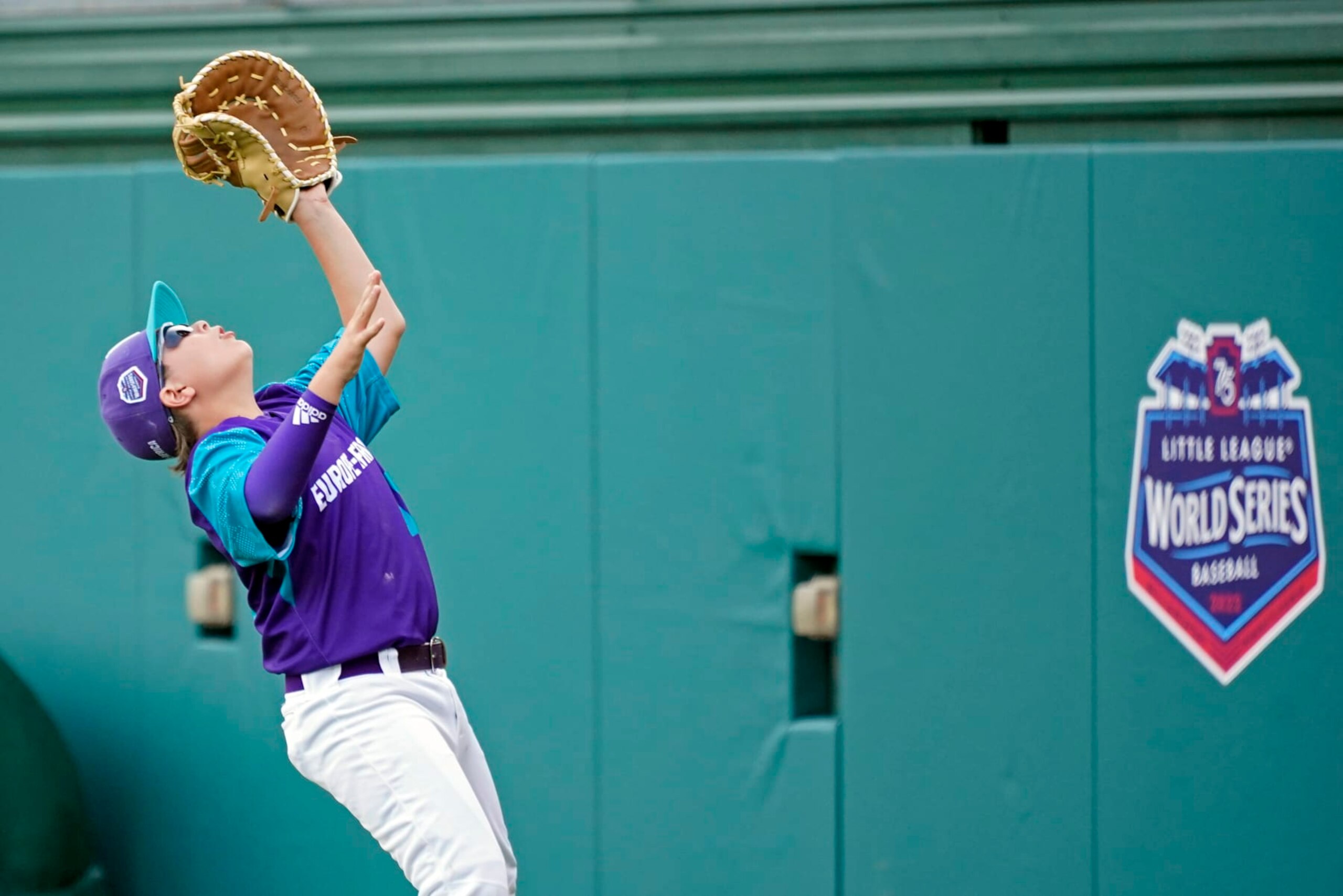 Italy first baseman Jacopo Bussolati (15) catches a ball in foul territory hit by Taiwan's Chen Yu-Ting during the fourth inning of a baseball game at the Little League World Series tournament in South Williamsport, Pa., Thursday, Aug. 18, 2022. (AP Photo/Tom E. Puskar)