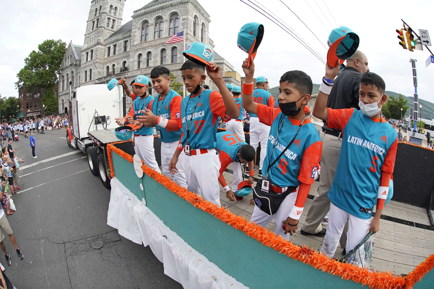 Latin America Region Champion Little League team from Managua, Nicaragua, rides in the Little League Grand Slam Parade in downtown Williamsport, Pa., on Monday, Aug. 15, 2022. The Little League World Series baseball tournament, featuring 20 teams from around the world, starts on August 17, 2022 in South Williamsport, Pa. (AP Photo/Gene J. Puskar)