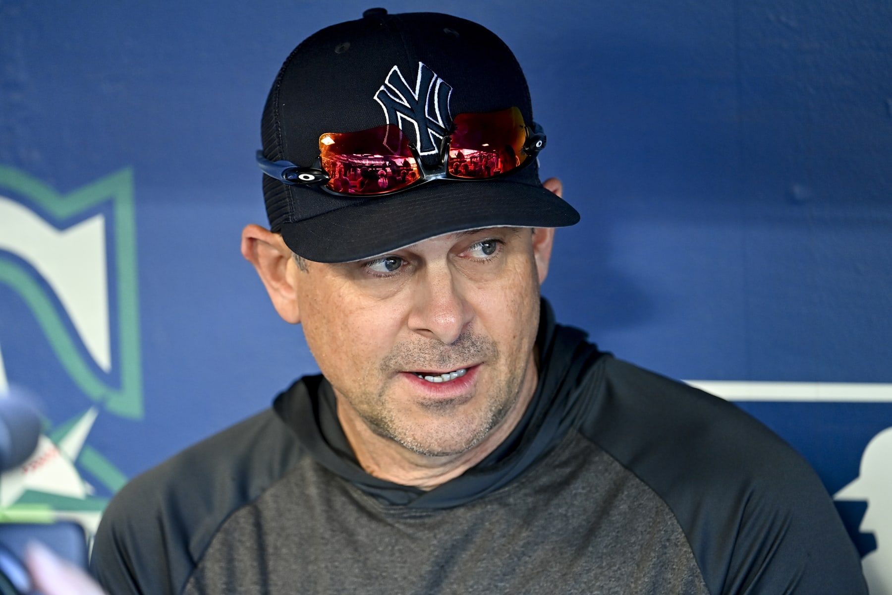 SEATTLE, WASHINGTON - AUGUST 09: Manager Aaron Boone #17 of the New York Yankees meets with the media before the game against the Seattle Mariners at T-Mobile Park on August 09, 2022 in Seattle, Washington. (Photo by Alika Jenner/Getty Images)
