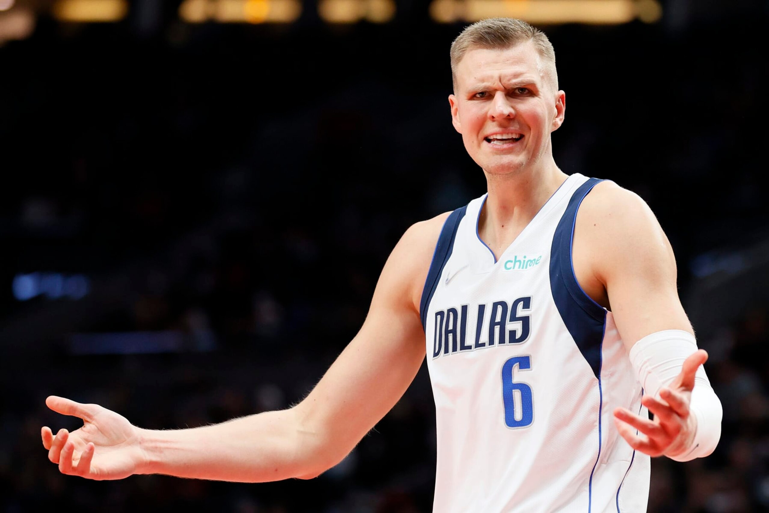 PORTLAND, OREGON - JANUARY 26: Kristaps Porzingis #6 of the Dallas Mavericks reacts during the third quarter against the Portland Trail Blazers at Moda Center on January 26, 2022 in Portland, Oregon. NOTE TO USER: User expressly acknowledges and agrees that, by downloading and/or using this photograph, User is consenting to the terms and conditions of the Getty Images License Agreement. (Photo by Steph Chambers/Getty Images)