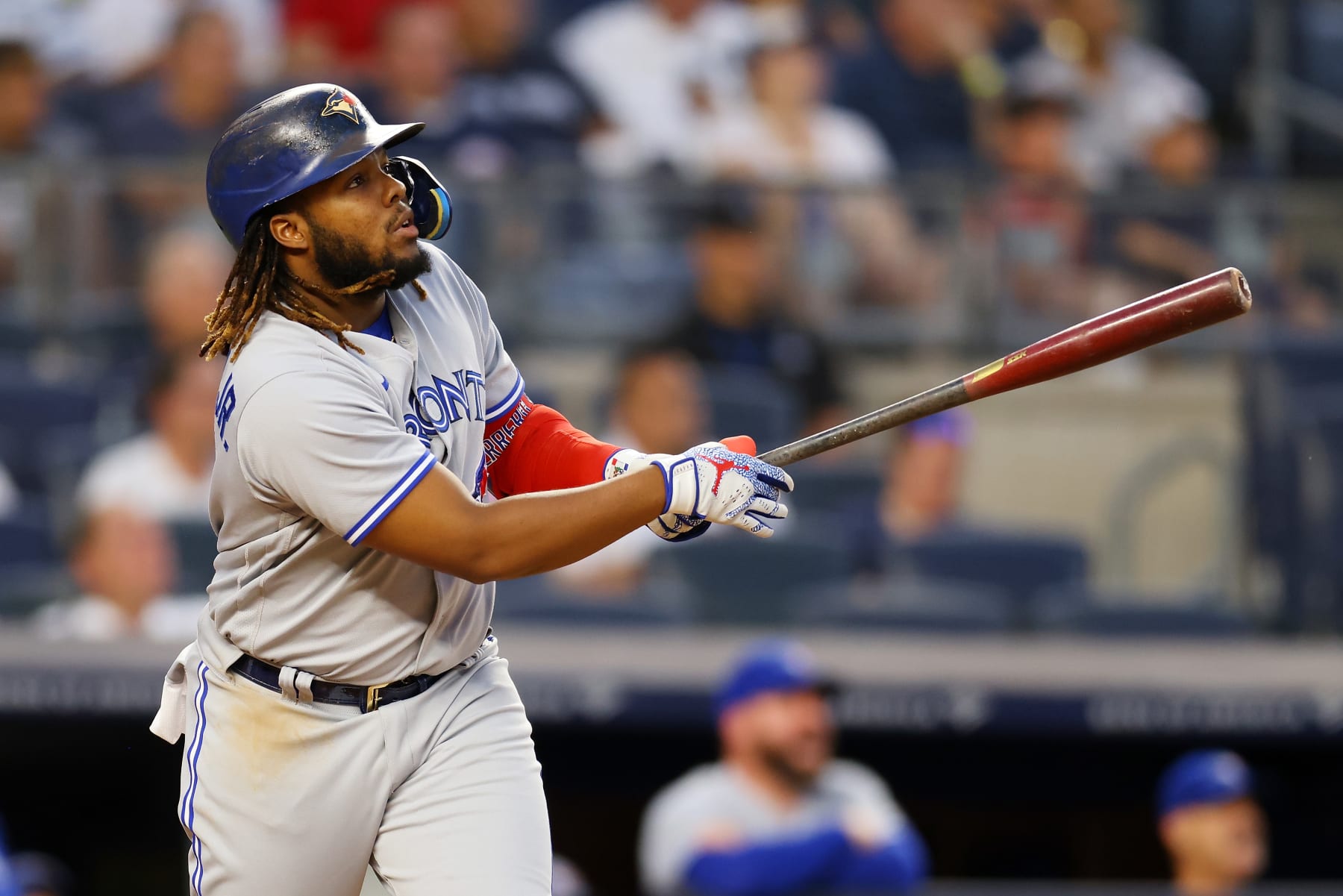 NEW YORK, NEW YORK - AUGUST 18: Vladimir Guerrero Jr. #27 of the Toronto Blue Jays hits a three-run home run to right field in the second inning against the New York Yankees at Yankee Stadium on August 18, 2022 in New York City. (Photo by Mike Stobe/Getty Images)