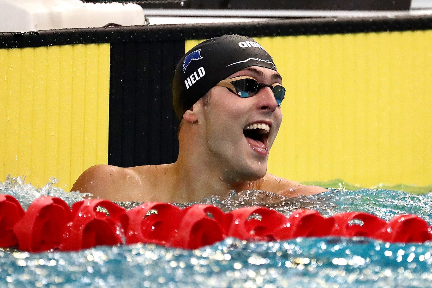 USA's Ryan Held reacts as he competes in the Men's 100m Freestyleduring the Duel in the Pool swimming event at the Sydney Olympic Park Aquatic Centre on August 20, 2022, in Sydney. - -- IMAGE RESTRICTED TO EDITORIAL USE - STRICTLY NO COMMERCIAL USE -- (Photo by JEREMY NG / AFP) / -- IMAGE RESTRICTED TO EDITORIAL USE - STRICTLY NO COMMERCIAL USE -- (Photo by JEREMY NG/AFP /AFP via Getty Images)