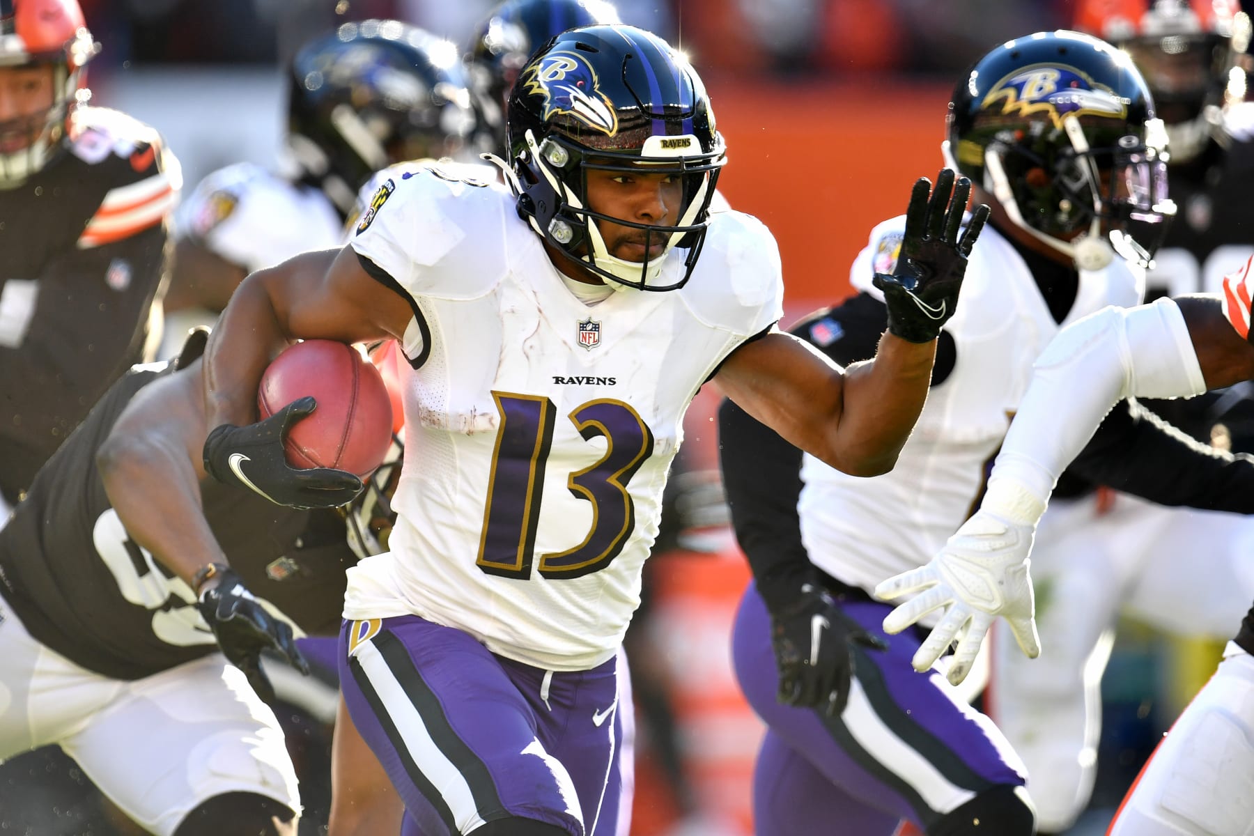 CLEVELAND, OHIO - DECEMBER 12: Devin Duvernay #13 of the Baltimore Ravens runs with the ball against the Cleveland Browns in the first half at FirstEnergy Stadium on December 12, 2021 in Cleveland, Ohio. (Photo by Jason Miller/Getty Images)