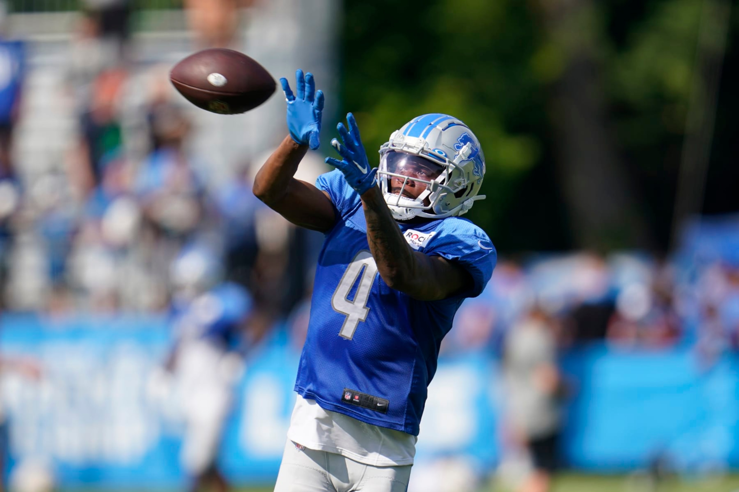 Detroit Lions wide receiver DJ Chark catches a pass during an NFL football practice in Allen Park, Mich., Monday, Aug. 1, 2022. (AP Photo/Paul Sancya) Detroit Lions wide receiver DJ Chark catches a pass during an NFL football practice in Allen Park, Mich., Monday, Aug. 1, 2022. (AP Photo/Paul Sancya)