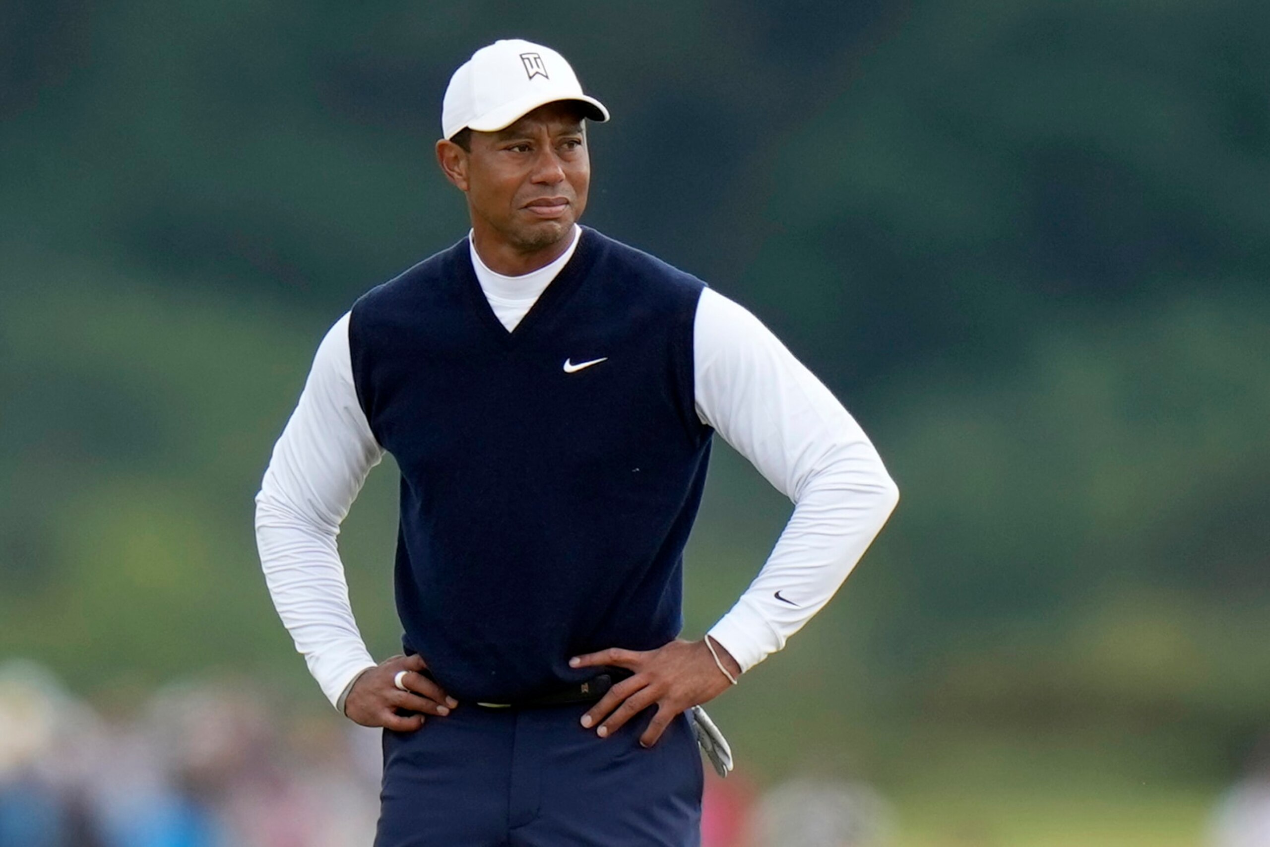 Tiger Woods of the US on the 11th hole during the first round of the British Open golf championship on the Old Course at St. Andrews, Scotland, Thursday July 14, 2022. Woods was scheduled to go to Wilmington Country Club on Tuesday, Aug. 16, 2022, for a private meeting of top players to discuss the threat of Saudi-funded LIV Golf, according to two people aware of the plans at the BMW Championship. They spoke to The Associated Press on condition of anonymity because of the privacy of the meeting. (AP Photo/Alastair Grant, File)