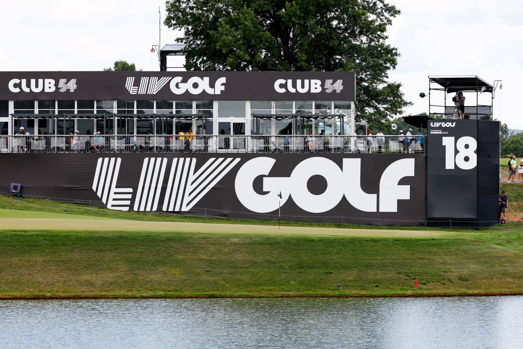 BEDMINSTER, NJ - JULY 31: A general view of the 18th green the LIV Golf logo and Club 54 during the 3rd round of the LIV Golf Invitational Series Bedminster on July 31, 2022 at Trump National Golf Club in Bedminster, New Jersey.  (Photo by Rich Graessle/Icon Sportswire via Getty Images)