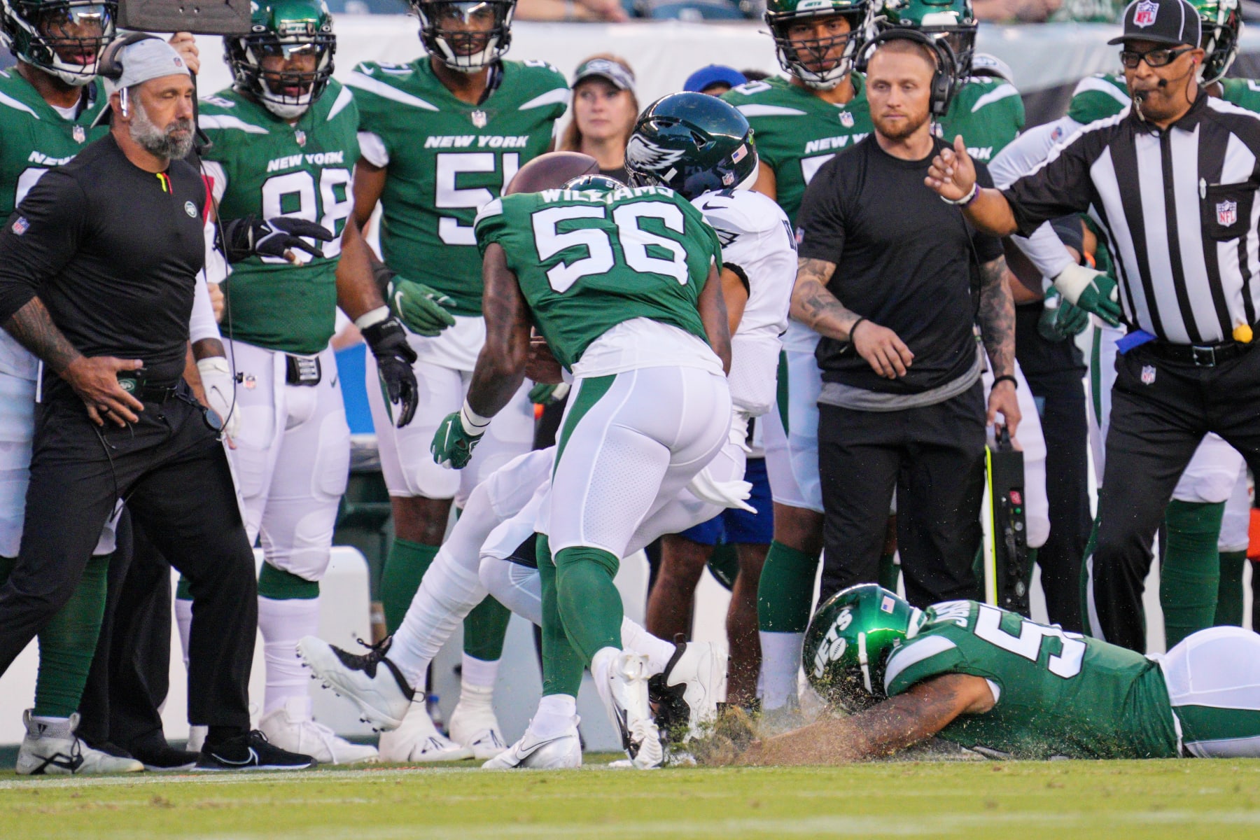 PHILADELPHIA, PA - AUGUST 12: Philadelphia Eagles quarterback Jalen Hurts (1) is hit out of bounds by New York Jets line backer Quincy Williams (56) during pre-season game between the New York Jets and the Philadelphia Eagles on August 12, 2022 at Lincoln Financial Field in Philadelphia PA. (Photo by Andy Lewis/Icon Sportswire via Getty Images)