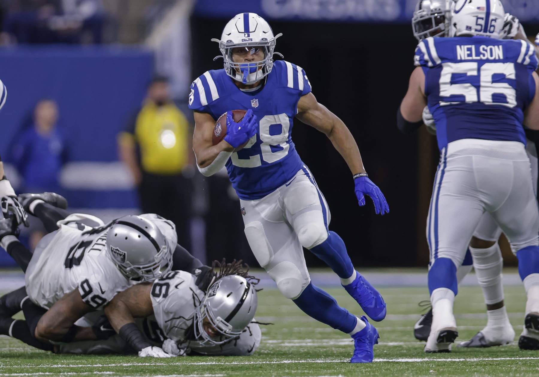 INDIANAPOLIS, IN - JANUARY 02: Jonathan Taylor #28 of the Indianapolis Colt runs the ball during the game against the Las Vegas Raiders at Lucas Oil Stadium on January 2, 2022 in Indianapolis, Indiana. (Photo by Michael Hickey/Getty Images)
