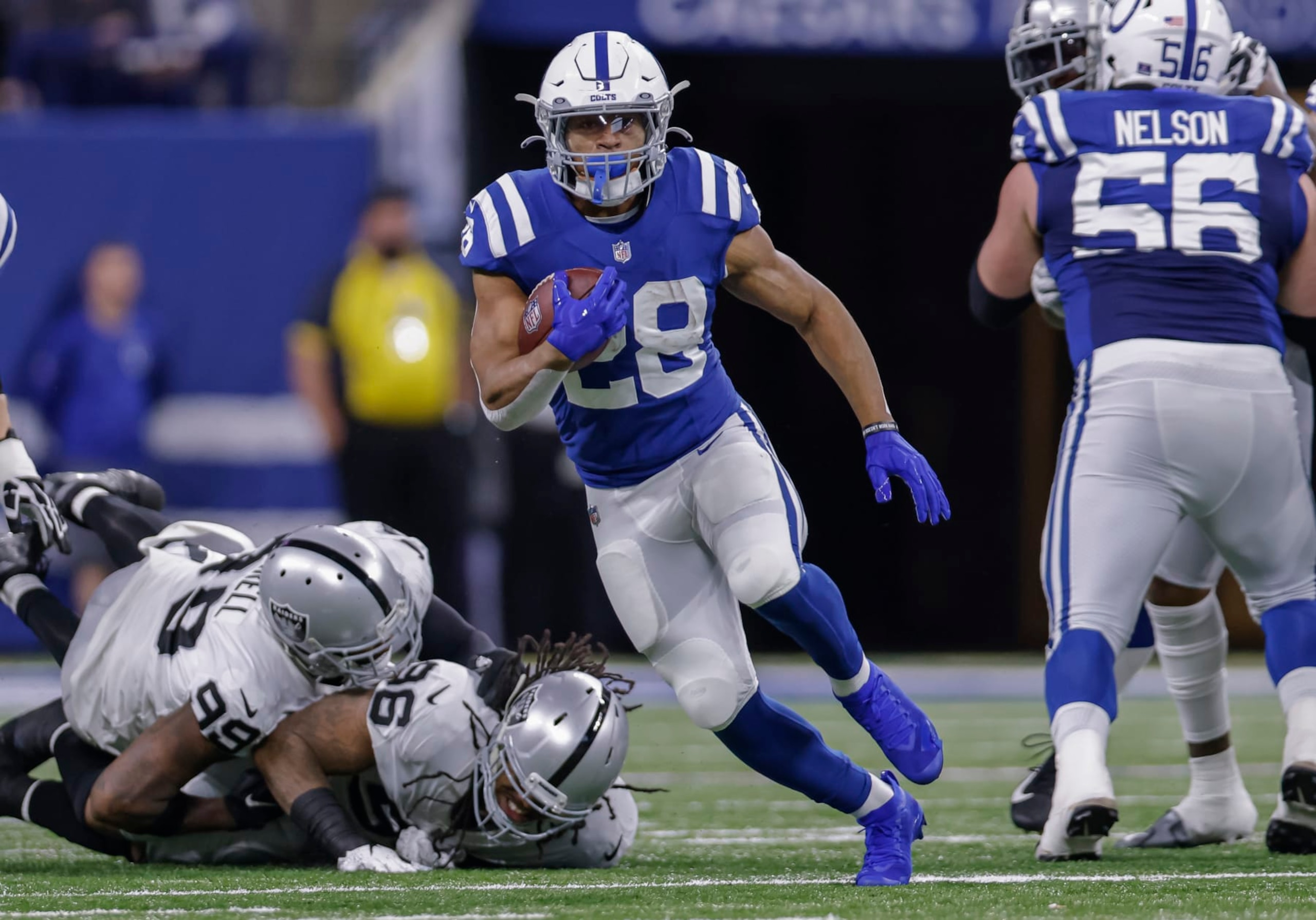 INDIANAPOLIS, IN - JANUARY 02: Jonathan Taylor #28 of the Indianapolis Colt runs the ball during the game against the Las Vegas Raiders at Lucas Oil Stadium on January 2, 2022 in Indianapolis, Indiana. (Photo by Michael Hickey/Getty Images)