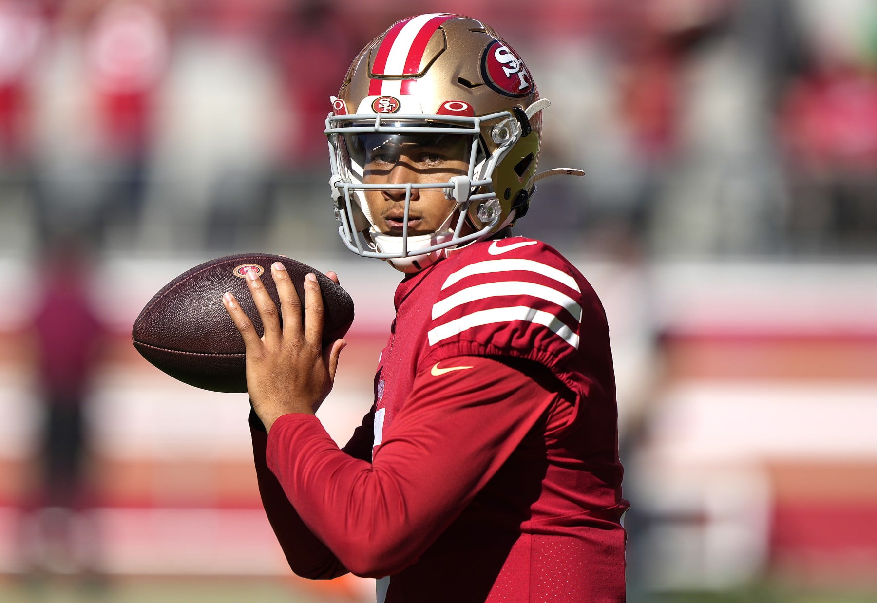 SANTA CLARA, CALIFORNIA - AUGUST 12: Trey Lance #5 of the San Francisco 49ers warms up prior to the start of a preseason NFL game against the Green Bay Packers at Levi's Stadium on August 12, 2022 in Santa Clara, California. (Photo by Thearon W. Henderson/Getty Images)