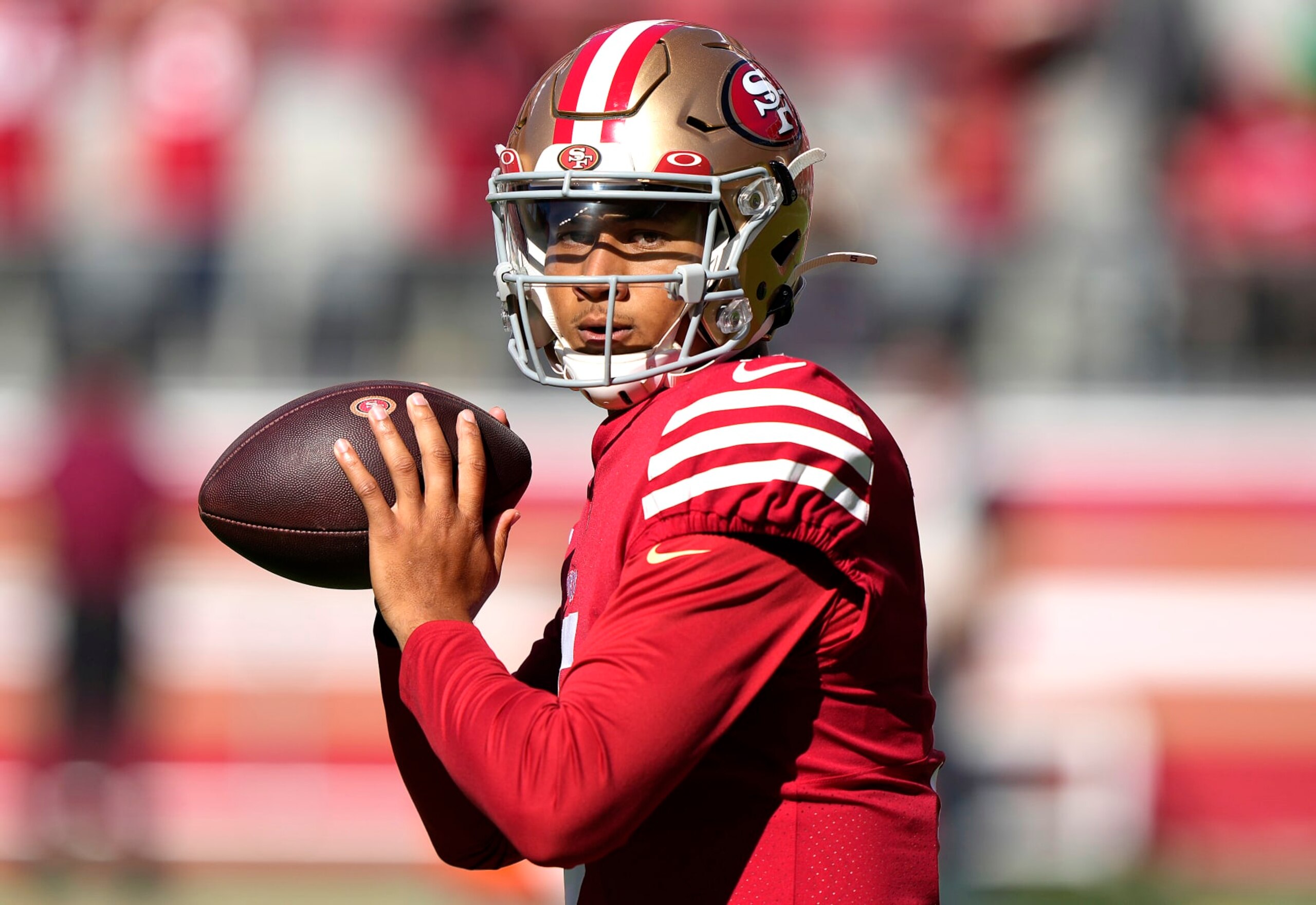 SANTA CLARA, CALIFORNIA - AUGUST 12: Trey Lance #5 of the San Francisco 49ers warms up prior to the start of a preseason NFL game against the Green Bay Packers at Levi's Stadium on August 12, 2022 in Santa Clara, California. (Photo by Thearon W. Henderson/Getty Images)