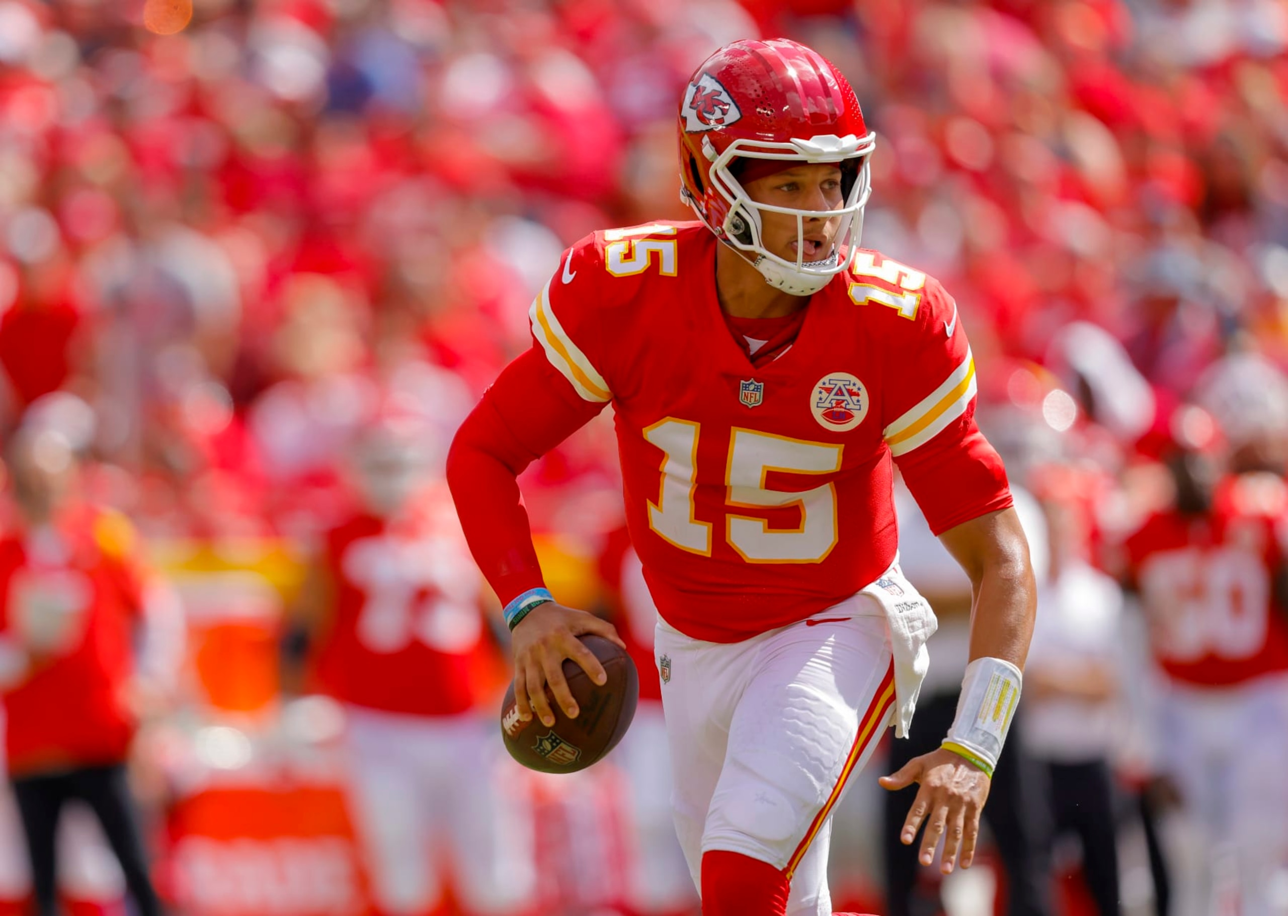KANSAS CITY, MO - AUGUST 20: Patrick Mahomes #15 of the Kansas City Chiefs scrambles during the second quarter against the Washington Commanders at Arrowhead Stadium on August 20, 2022 in Kansas City, Missouri. (Photo by David Eulitt/Getty Images)