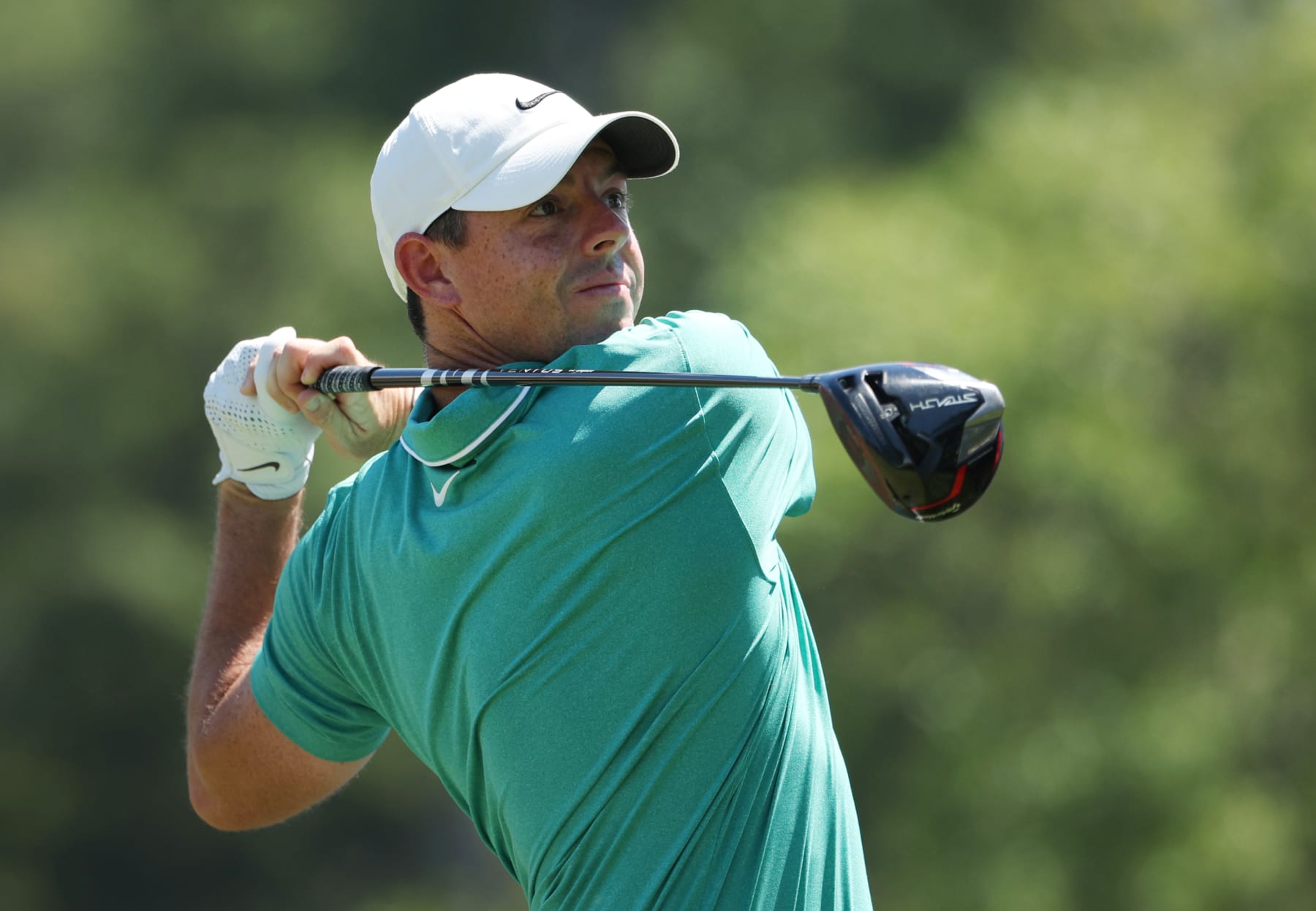 WILMINGTON, DELAWARE - AUGUST 20: Rory McIlroy of Northern Ireland plays his shot from the third tee during the third round of the BMW Championship at Wilmington Country Club on August 20, 2022 in Wilmington, Delaware. (Photo by Rob Carr/Getty Images)