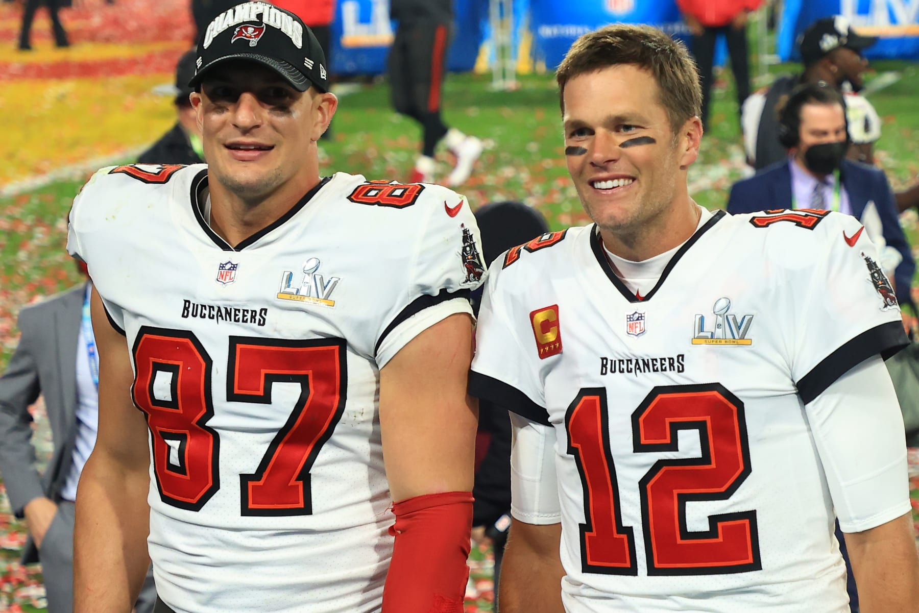 TAMPA, FLORIDA - FEBRUARY 07: Rob Gronkowski #87 and Tom Brady #12 of the Tampa Bay Buccaneers celebrate after defeating the Kansas City Chiefs in Super Bowl LV at Raymond James Stadium on February 07, 2021 in Tampa, Florida. The Buccaneers defeated the Chiefs 31-9. (Photo by Mike Ehrmann/Getty Images)