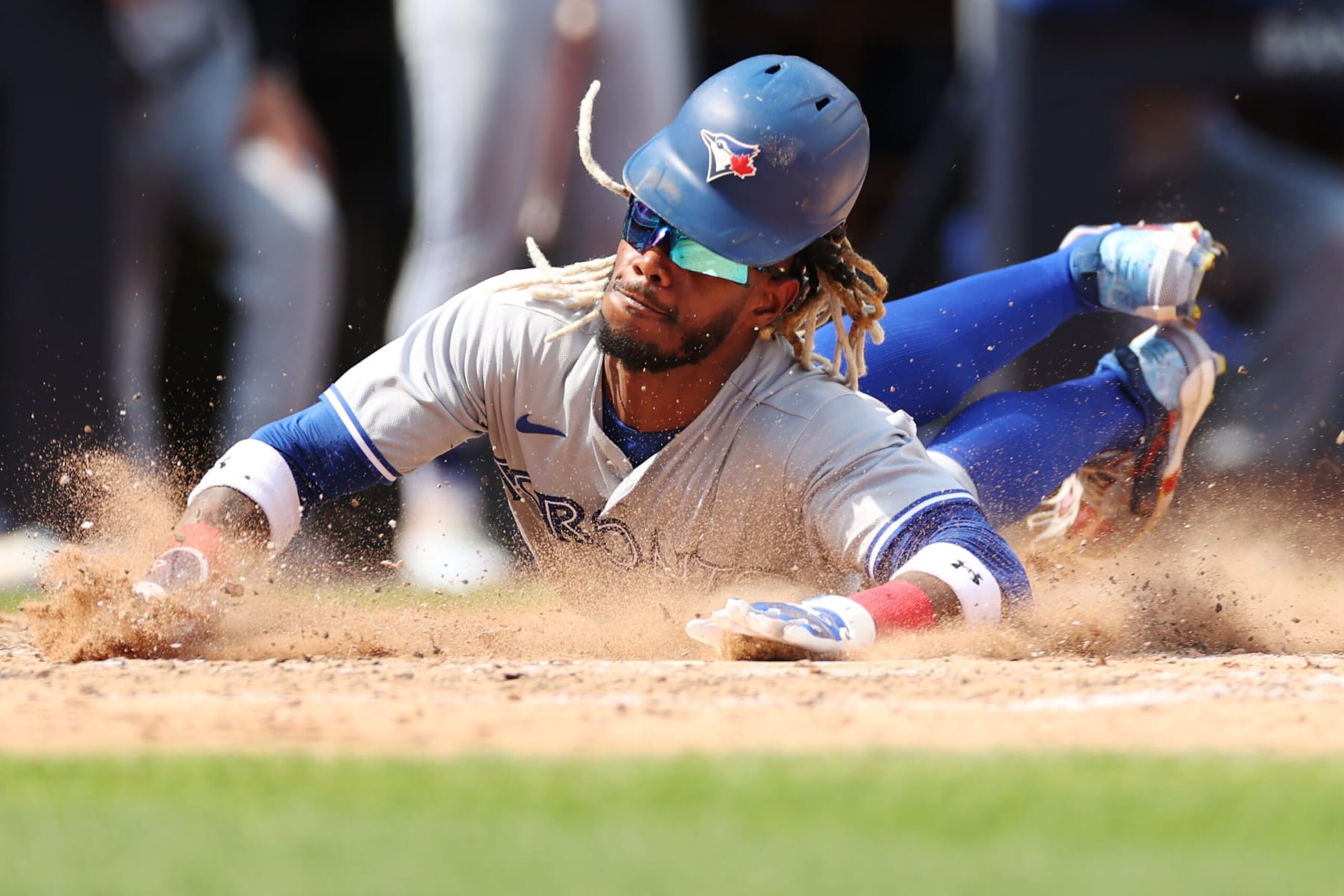 NEW YORK, NEW YORK - AUGUST 20: Raimel Tapia #15 of the Toronto Blue Jays slides into home on a 2-RBI double hit by Alejandro Kirk #30 (not pictured) during the fifth inning against the New York Yankees at Yankee Stadium on August 20, 2022 in the Bronx borough of New York City. (Photo by Sarah Stier/Getty Images) NEW YORK, NEW YORK - AUGUST 20: Raimel Tapia #15 of the Toronto Blue Jays slides into home on a 2-RBI double hit by Alejandro Kirk #30 (not pictured) during the fifth inning against the New York Yankees at Yankee Stadium on August 20, 2022 in the Bronx borough of New York City. (Photo by Sarah Stier/Getty Images)